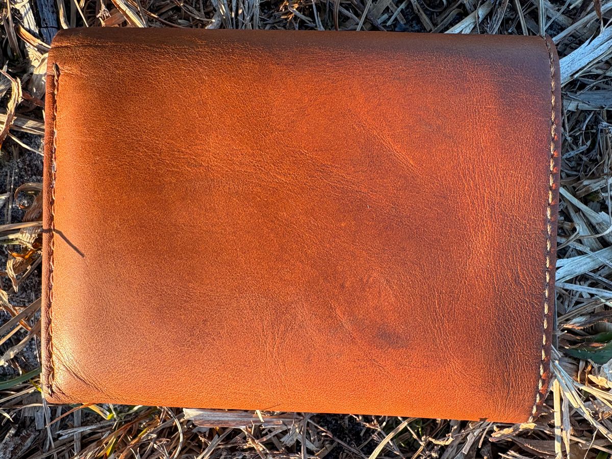 Photo by MuttBarker on February 5, 2026 of the Rodos Leather Crafts Camel Full Grain Leather Trifold Wallet in Tochigi Oil Vachetta #1 Light Brown.