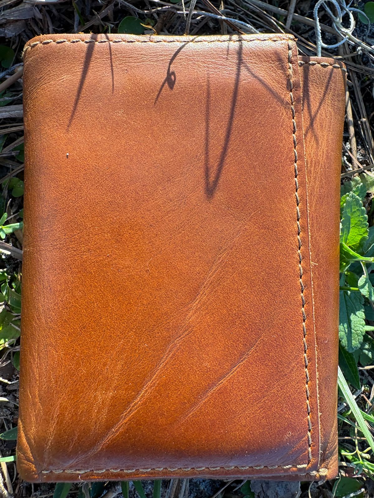 Photo by MuttBarker on March 5, 2026 of the Rodos Leather Crafts Camel Full Grain Leather Trifold Wallet in Tochigi Oil Vachetta #1 Light Brown.