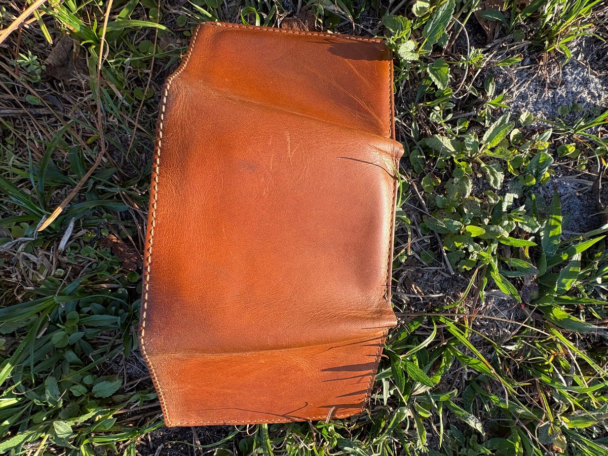 Photo by MuttBarker on March 5, 2026 of the Rodos Leather Crafts Camel Full Grain Leather Trifold Wallet in Tochigi Oil Vachetta #1 Light Brown.