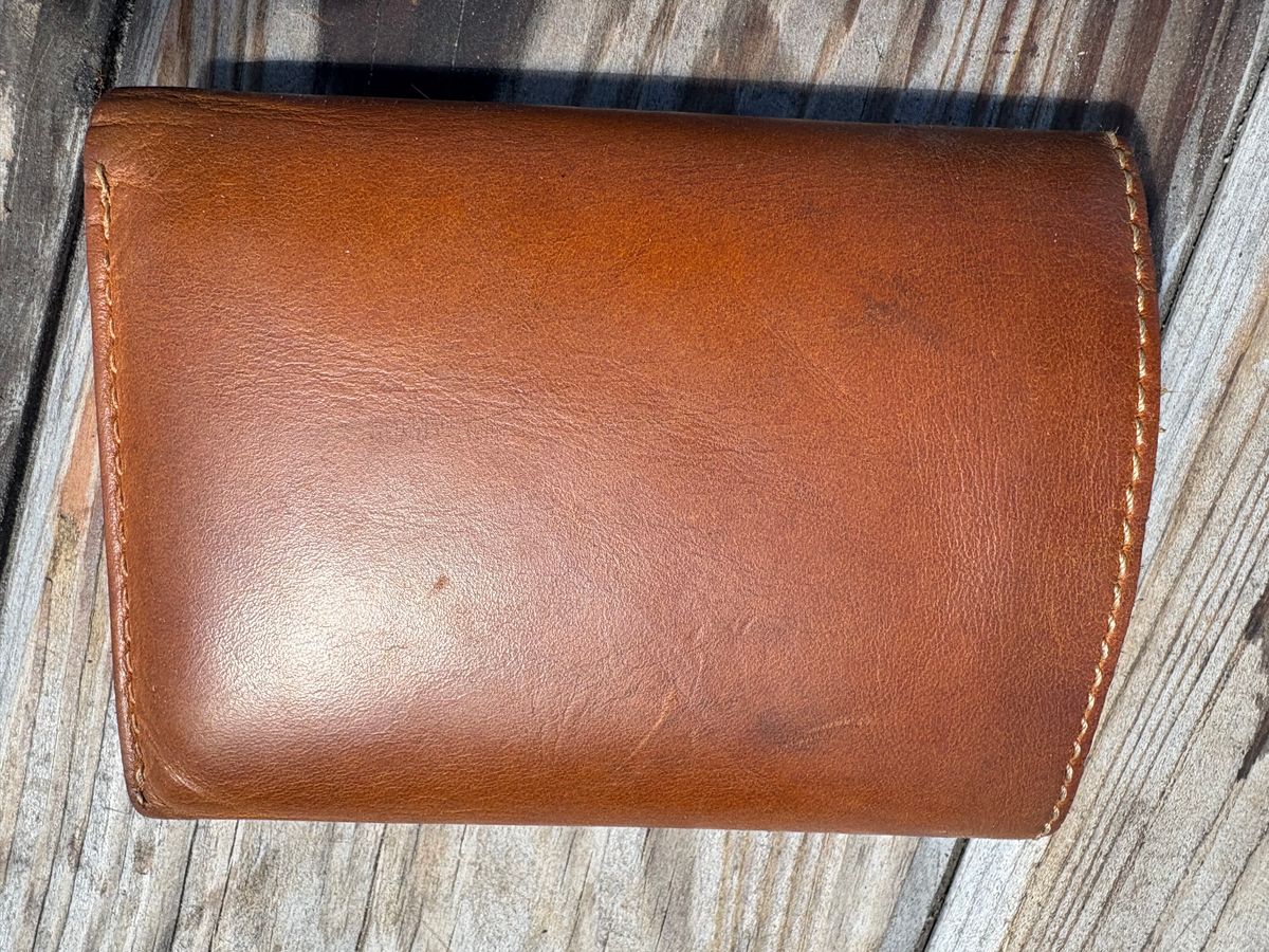 Photo by MuttBarker on April 4, 2026 of the Rodos Leather Crafts Camel Full Grain Leather Trifold Wallet in Tochigi Oil Vachetta #1 Light Brown.