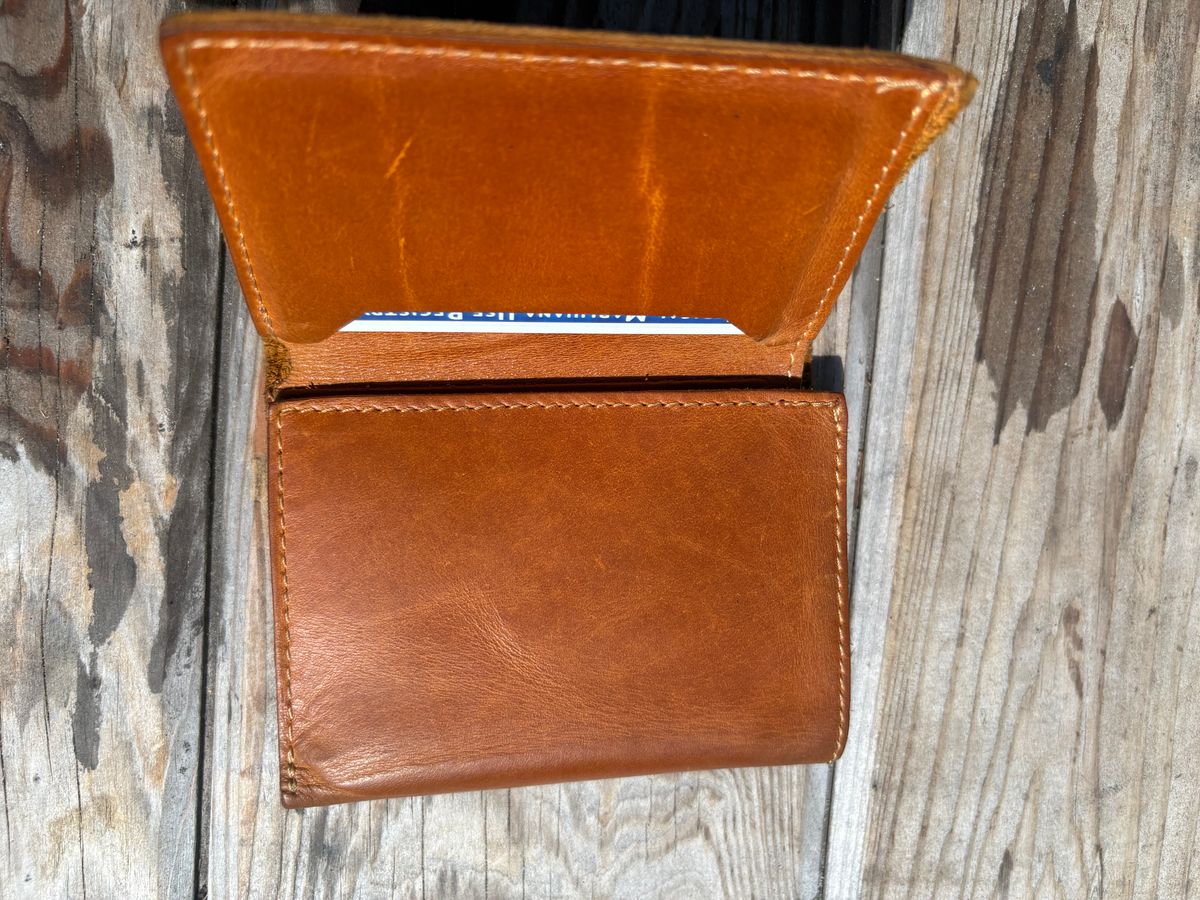 Photo by MuttBarker on April 4, 2026 of the Rodos Leather Crafts Camel Full Grain Leather Trifold Wallet in Tochigi Oil Vachetta #1 Light Brown.