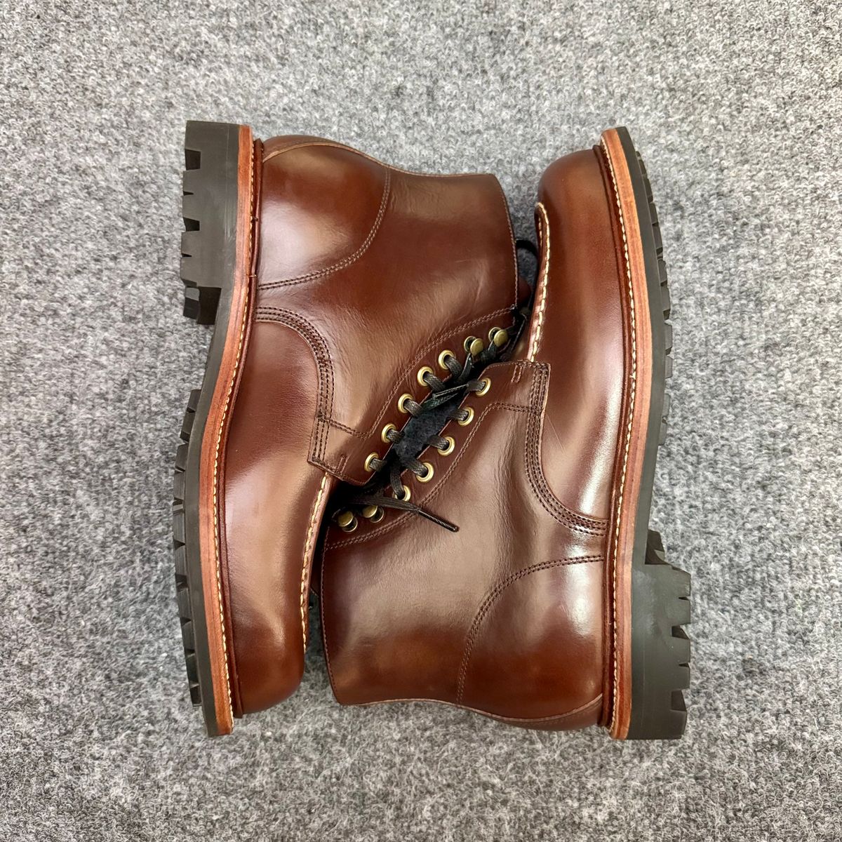 Photo by stinkypatina on October 1, 2025 of the Grant Stone Brass Boot in Horween Crimson Chromexcel.