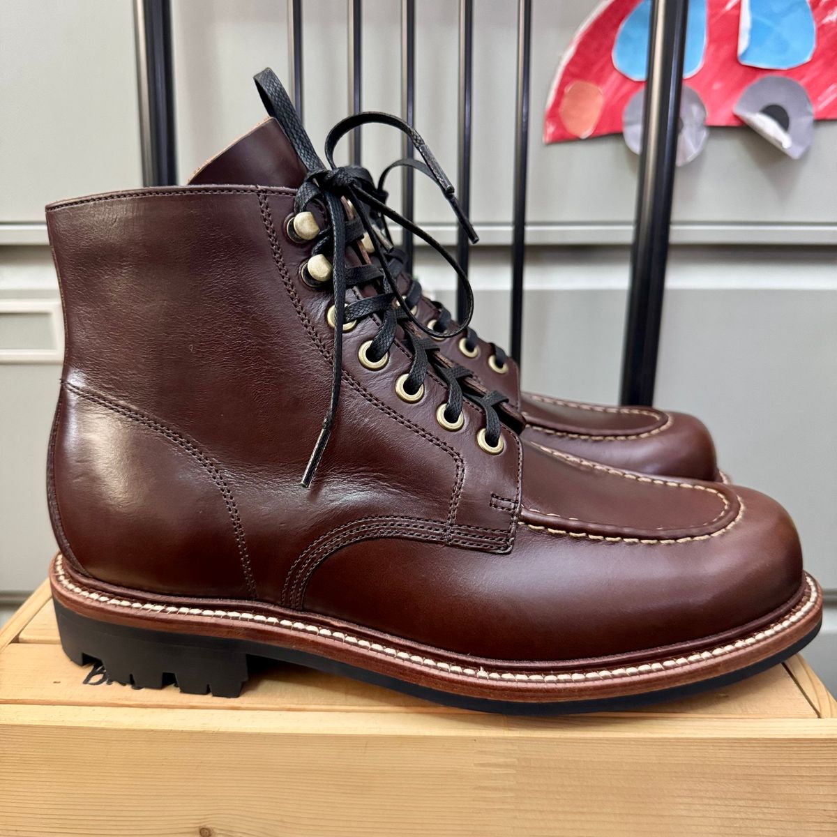 Photo by stinkypatina on October 1, 2025 of the Grant Stone Brass Boot in Horween Crimson Chromexcel.