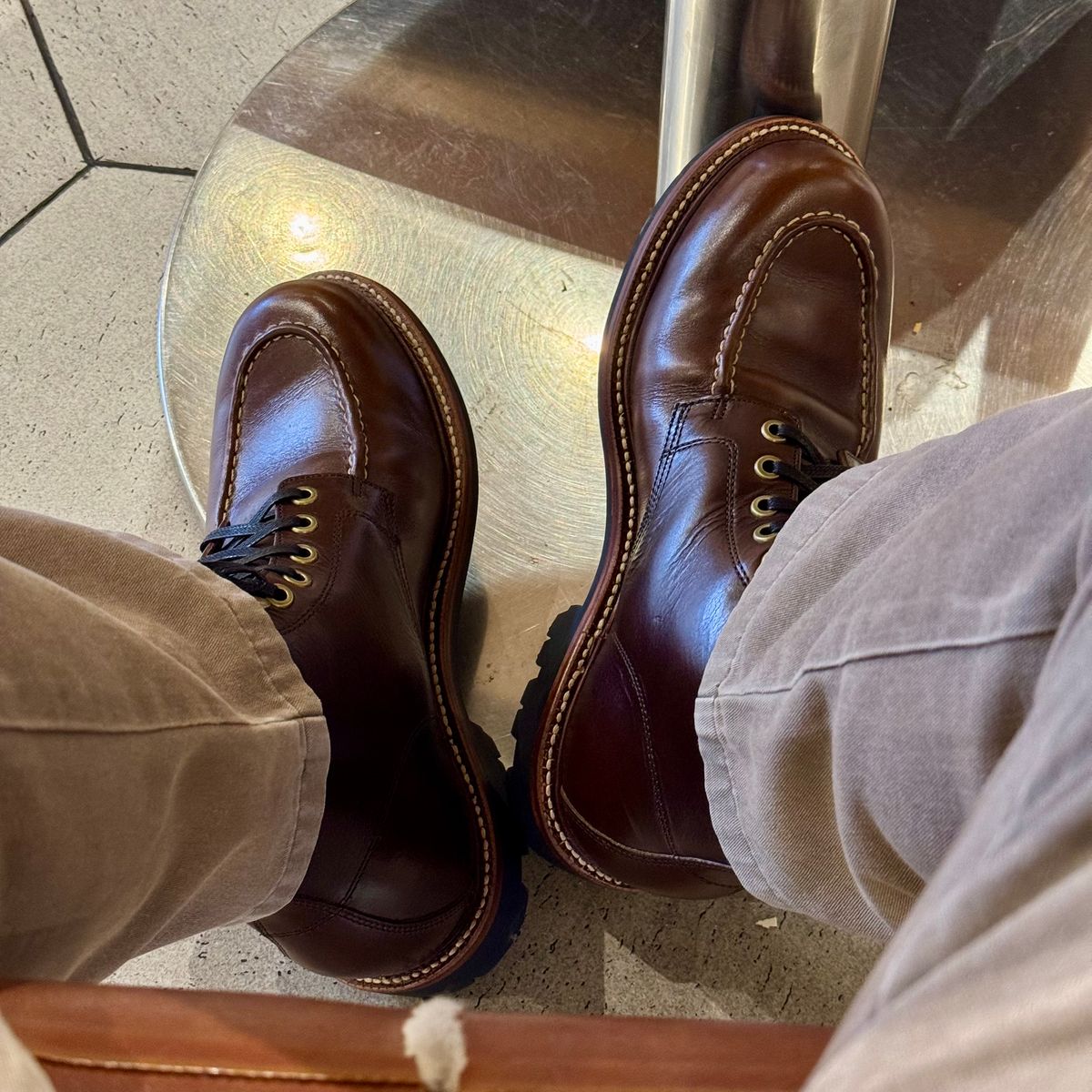 Photo by stinkypatina on October 2, 2025 of the Grant Stone Brass Boot in Horween Crimson Chromexcel.