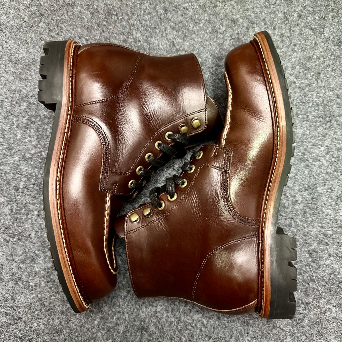Photo by stinkypatina on October 12, 2025 of the Grant Stone Brass Boot in Horween Crimson Chromexcel.
