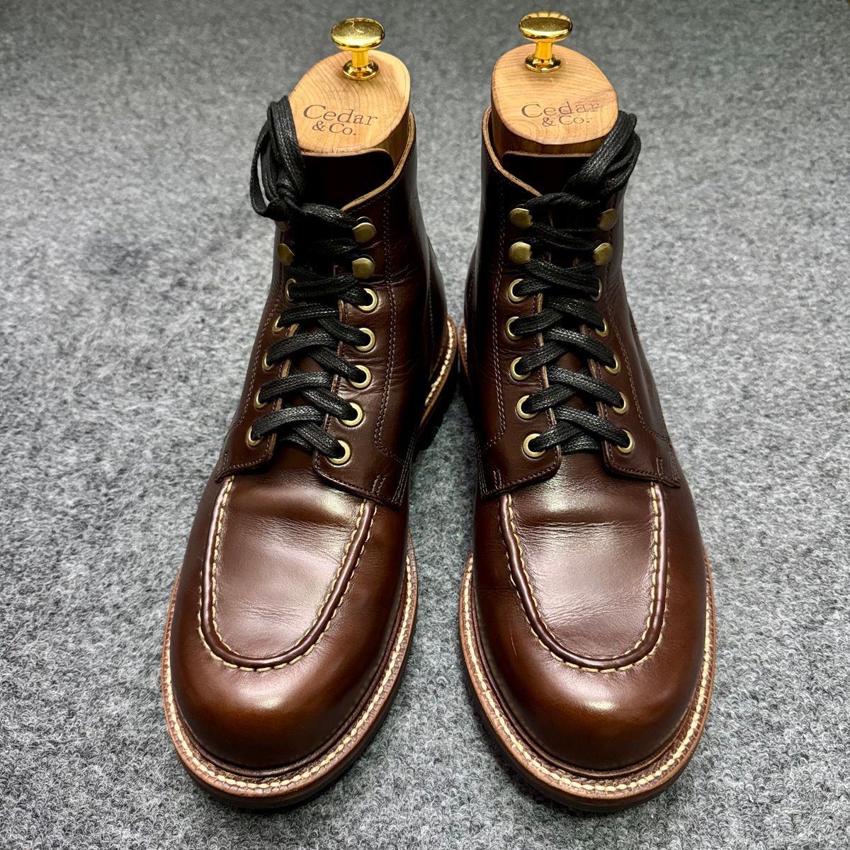 Photo by stinkypatina on October 23, 2025 of the Grant Stone Brass Boot in Horween Crimson Chromexcel.