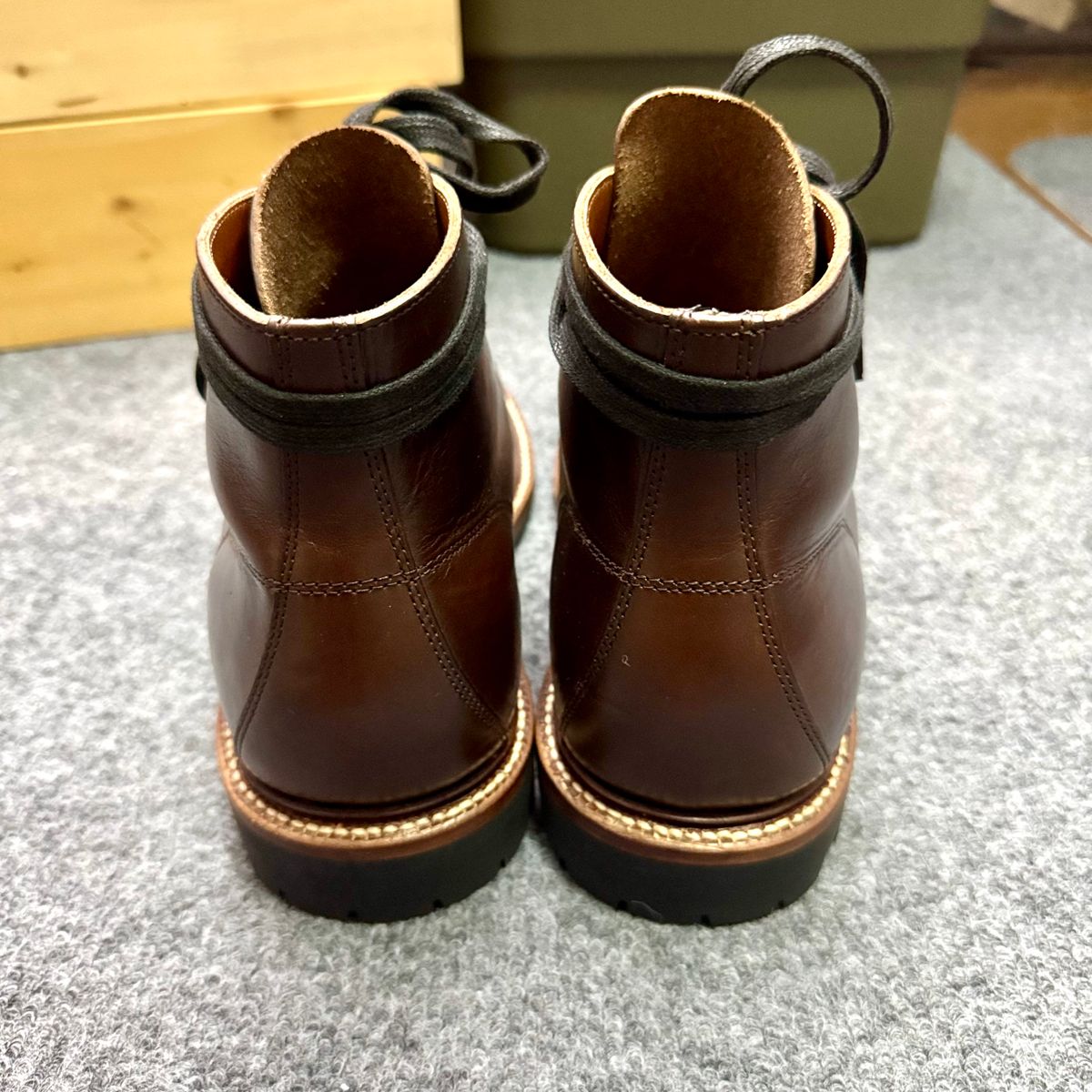 Photo by stinkypatina on November 1, 2025 of the Grant Stone Brass Boot in Horween Crimson Chromexcel.