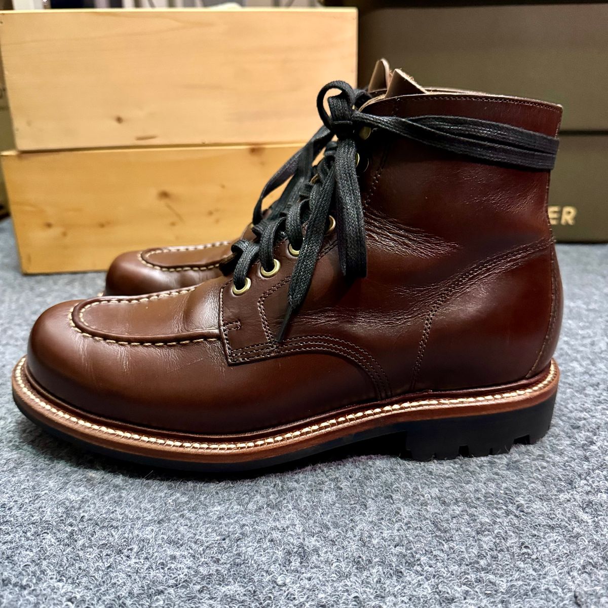 Photo by stinkypatina on November 1, 2025 of the Grant Stone Brass Boot in Horween Crimson Chromexcel.