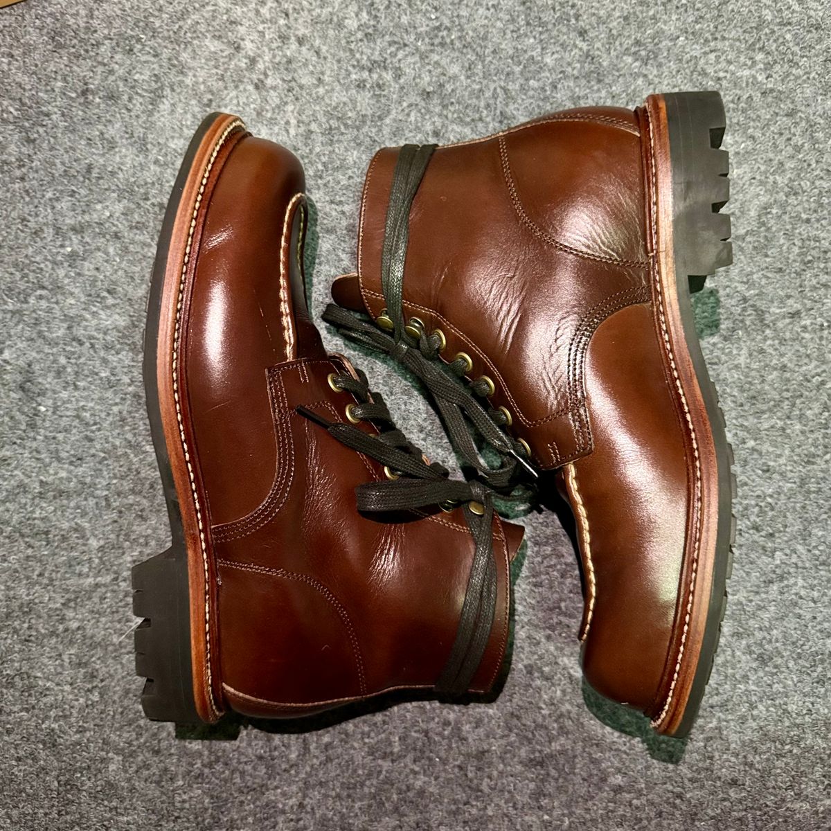 Photo by stinkypatina on November 1, 2025 of the Grant Stone Brass Boot in Horween Crimson Chromexcel.