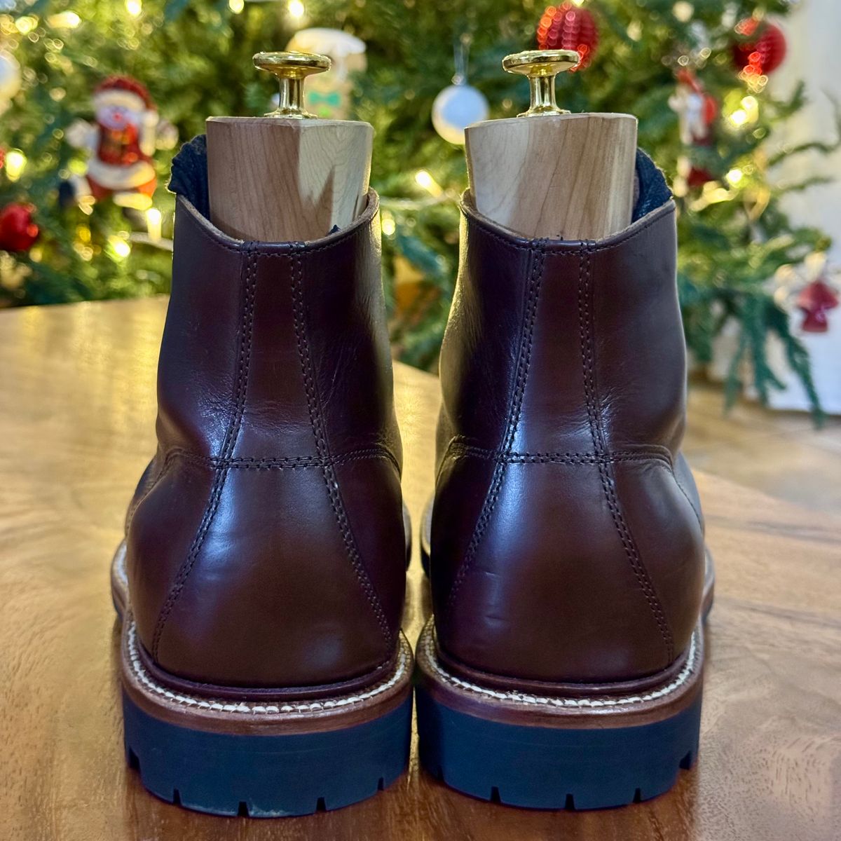 Photo by stinkypatina on December 2, 2025 of the Grant Stone Brass Boot in Horween Crimson Chromexcel.