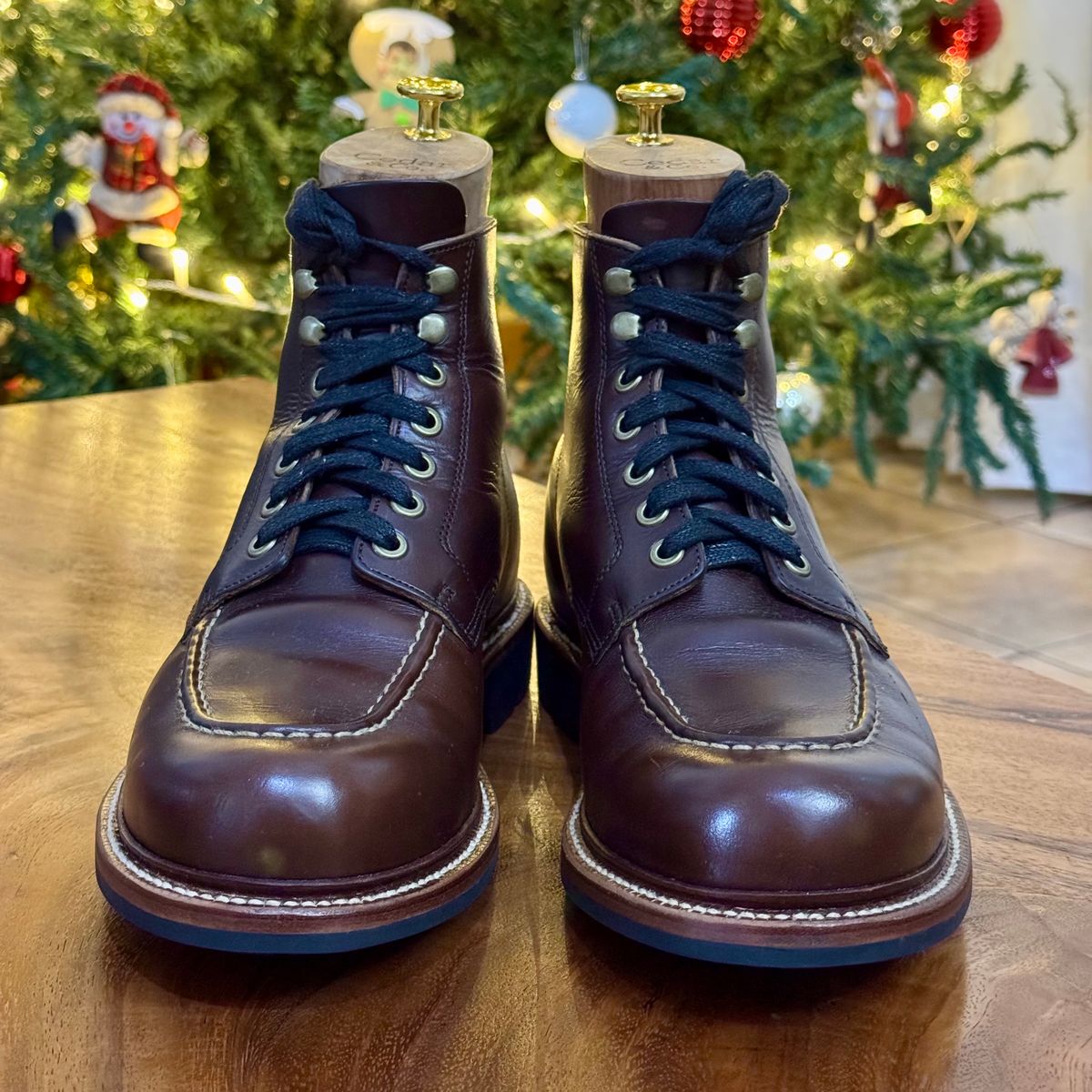 Photo by stinkypatina on December 2, 2025 of the Grant Stone Brass Boot in Horween Crimson Chromexcel.