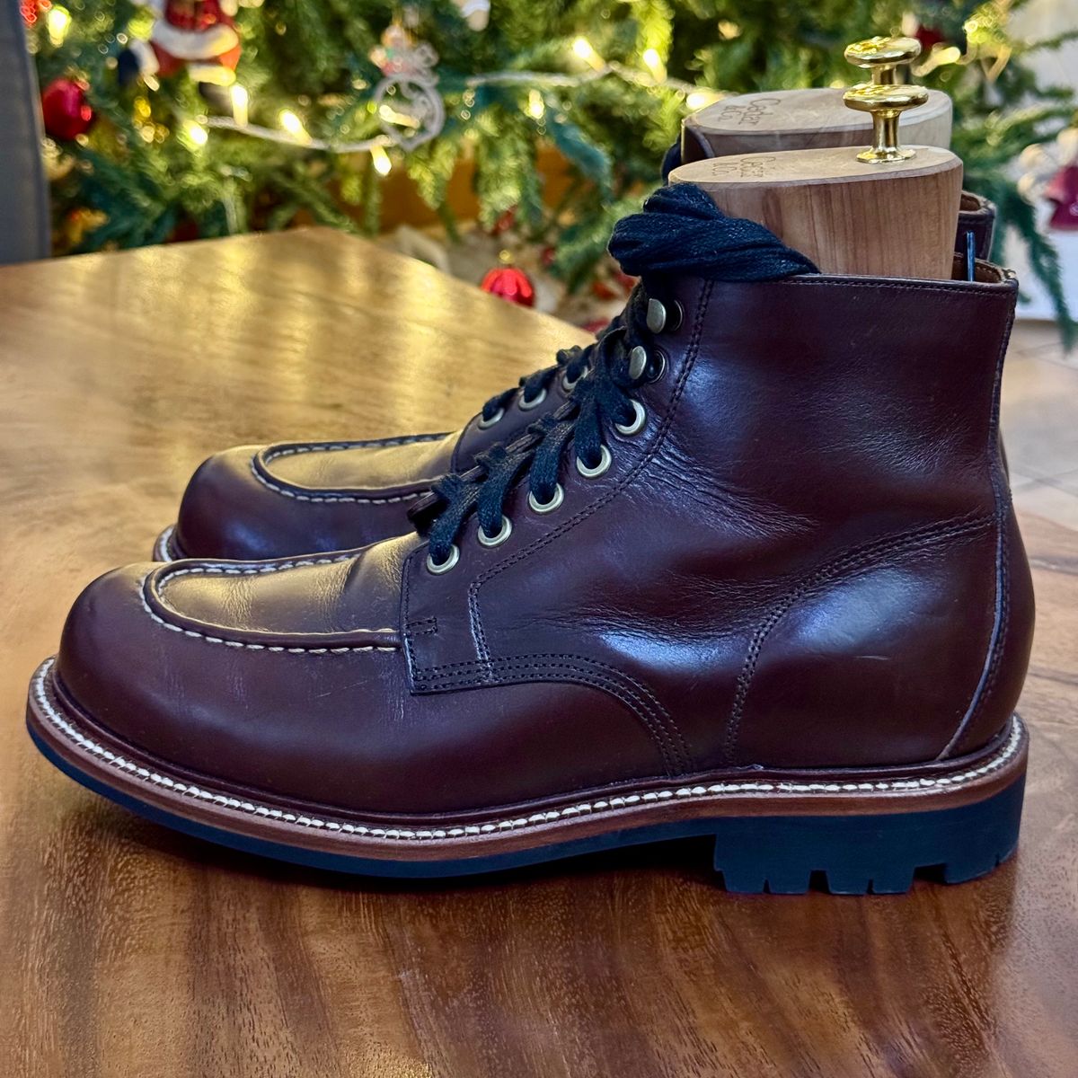 Photo by stinkypatina on December 2, 2025 of the Grant Stone Brass Boot in Horween Crimson Chromexcel.
