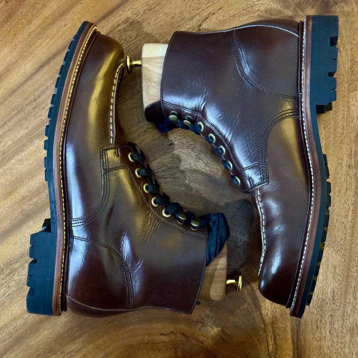 Photo by stinkypatina on December 2, 2025 of the Grant Stone Brass Boot in Horween Crimson Chromexcel.