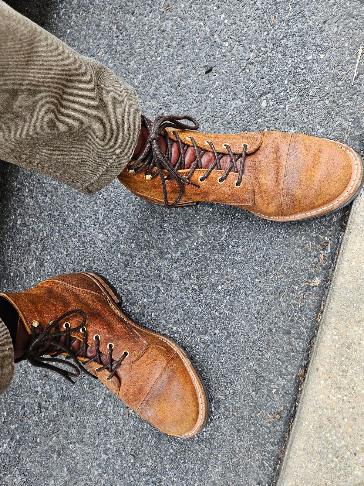 Photo by justinmcgustin on April 11, 2023 of the Truman Cap Toe Boot in C.F. Stead Coach Rambler.