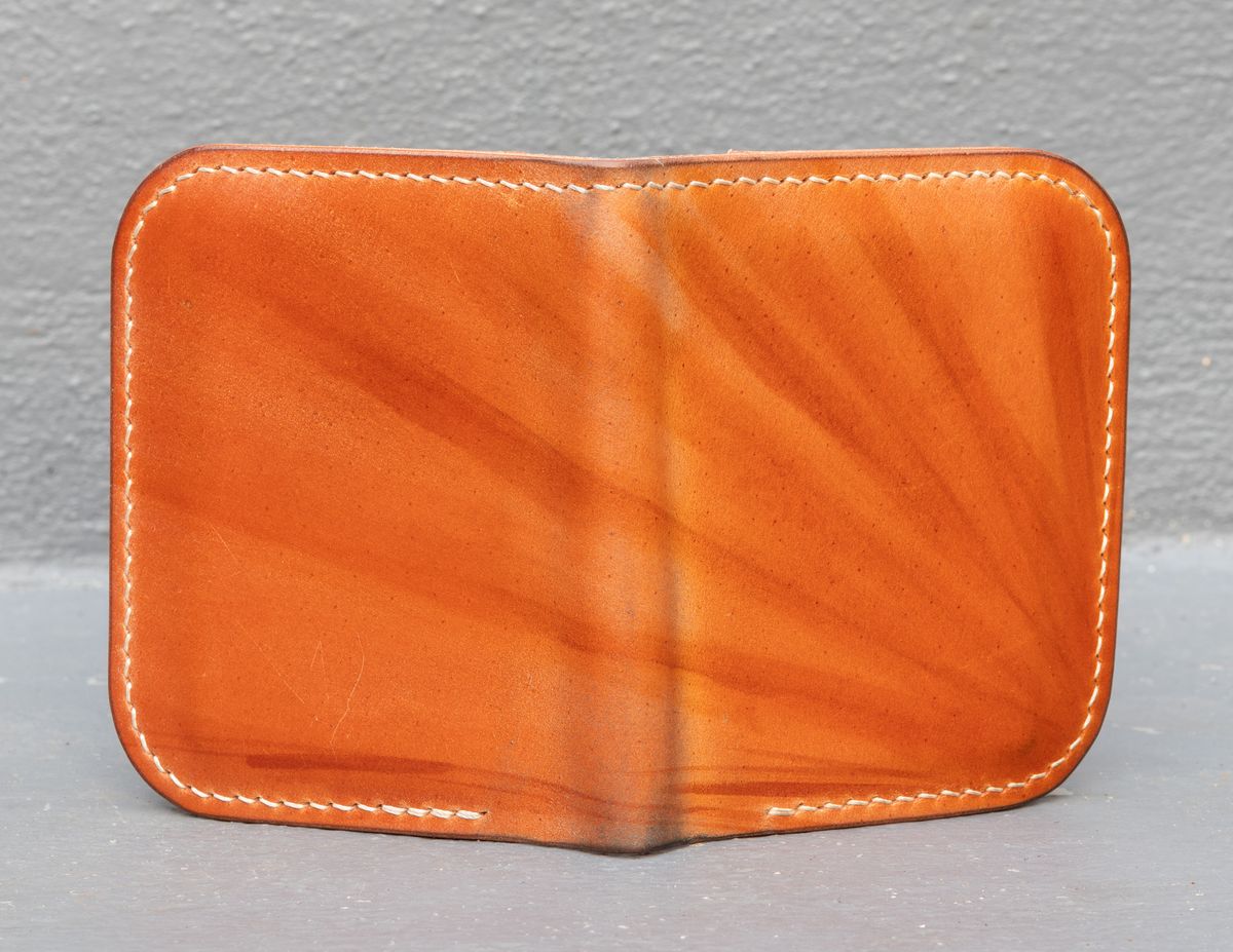 Photo by JewishJesus on November 2, 2025 of the Wild Frontier Goods Frontier Bifold Wallet in Kakishibu Hand Painted Shell Cordovan & Natural Buffed Cowhide.