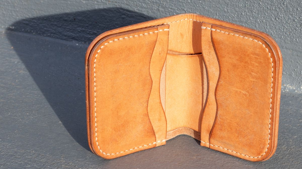 Photo by JewishJesus on January 1, 2026 of the Wild Frontier Goods Frontier Bifold Wallet in Kakishibu Hand Painted Shell Cordovan & Natural Buffed Cowhide.