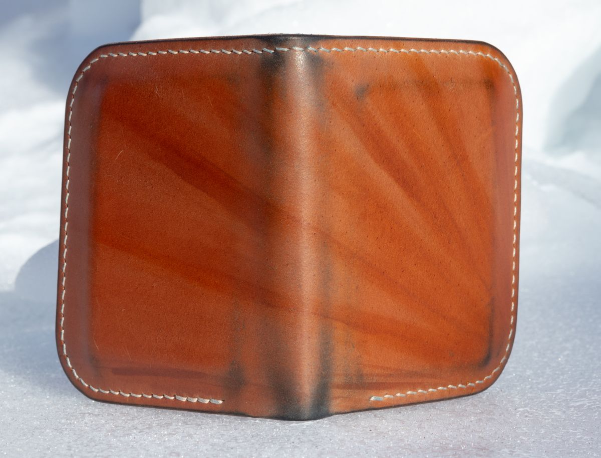 Photo by JewishJesus on January 30, 2026 of the Wild Frontier Goods Frontier Bifold Wallet in Kakishibu Hand Painted Shell Cordovan & Natural Buffed Cowhide.