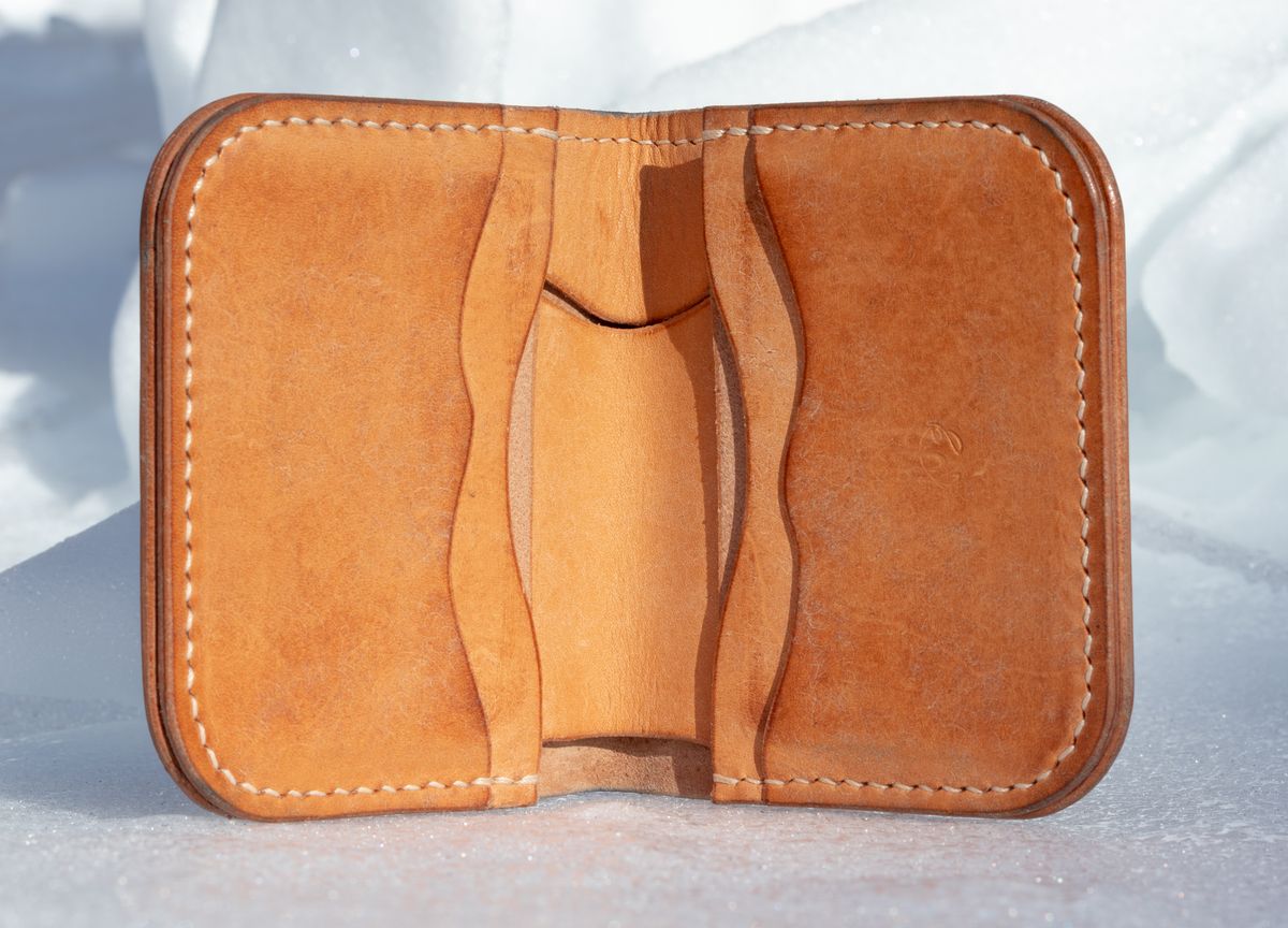 Photo by JewishJesus on January 30, 2026 of the Wild Frontier Goods Frontier Bifold Wallet in Kakishibu Hand Painted Shell Cordovan & Natural Buffed Cowhide.