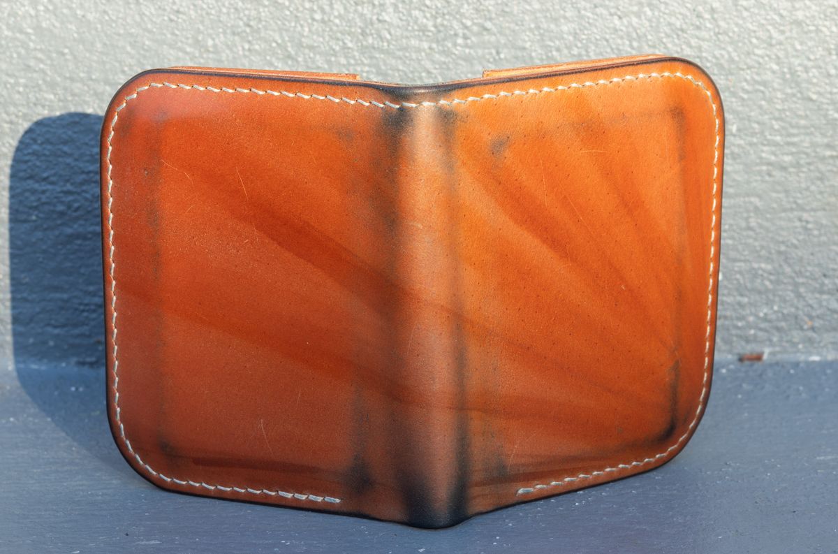 Photo by JewishJesus on March 1, 2026 of the Wild Frontier Goods Frontier Bifold Wallet in Kakishibu Hand Painted Shell Cordovan & Natural Buffed Cowhide.