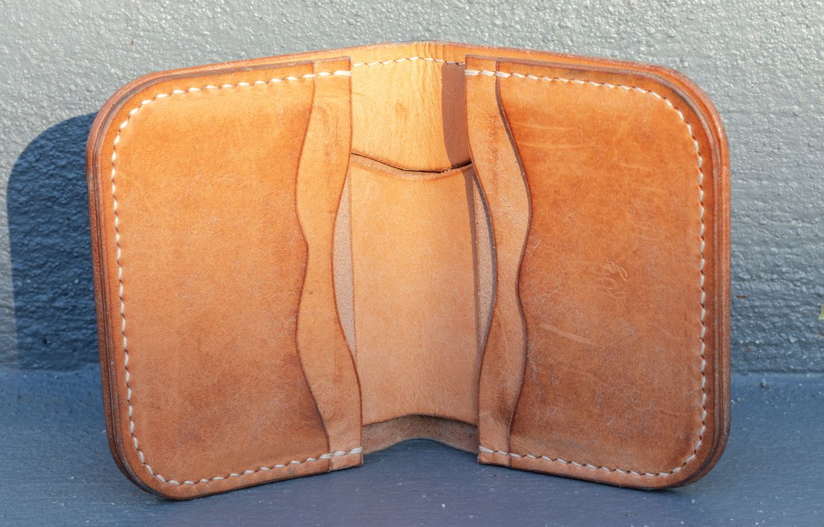 Photo by JewishJesus on March 1, 2026 of the Wild Frontier Goods Frontier Bifold Wallet in Kakishibu Hand Painted Shell Cordovan & Natural Buffed Cowhide.