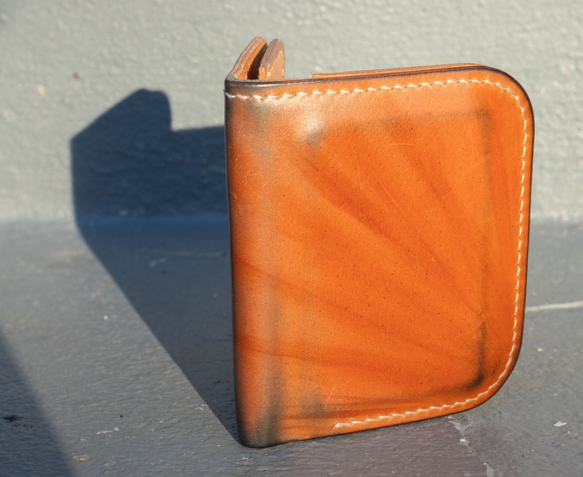 Photo by JewishJesus on March 1, 2026 of the Wild Frontier Goods Frontier Bifold Wallet in Kakishibu Hand Painted Shell Cordovan & Natural Buffed Cowhide.