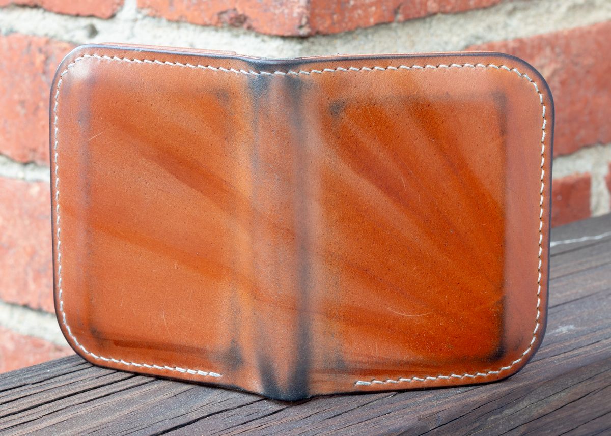 Photo by JewishJesus on April 1, 2026 of the Wild Frontier Goods Frontier Bifold Wallet in Kakishibu Hand Painted Shell Cordovan & Natural Buffed Cowhide.