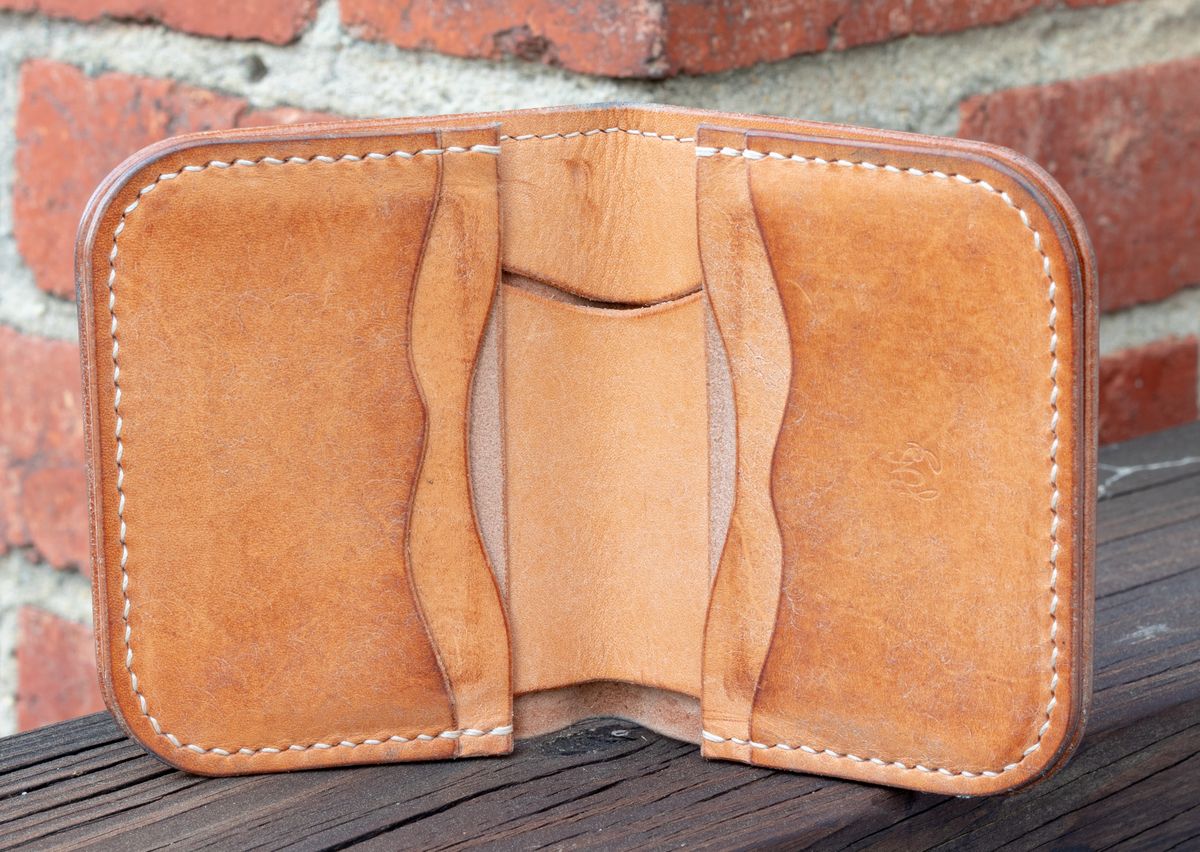 Photo by JewishJesus on April 1, 2026 of the Wild Frontier Goods Frontier Bifold Wallet in Kakishibu Hand Painted Shell Cordovan & Natural Buffed Cowhide.