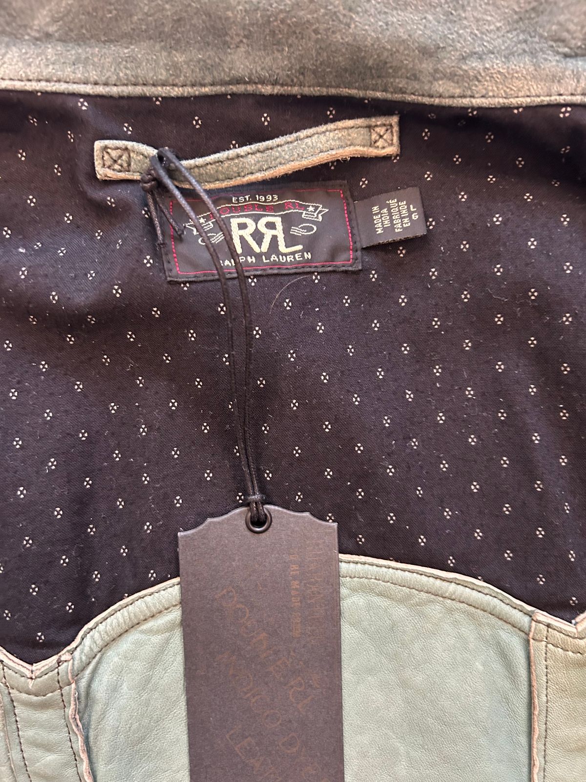 Photo by Patrick_Kwon on May 27, 2025 of the RRL Indigo Dyed Sheepskin Leather Jacket in Sheep Skin.