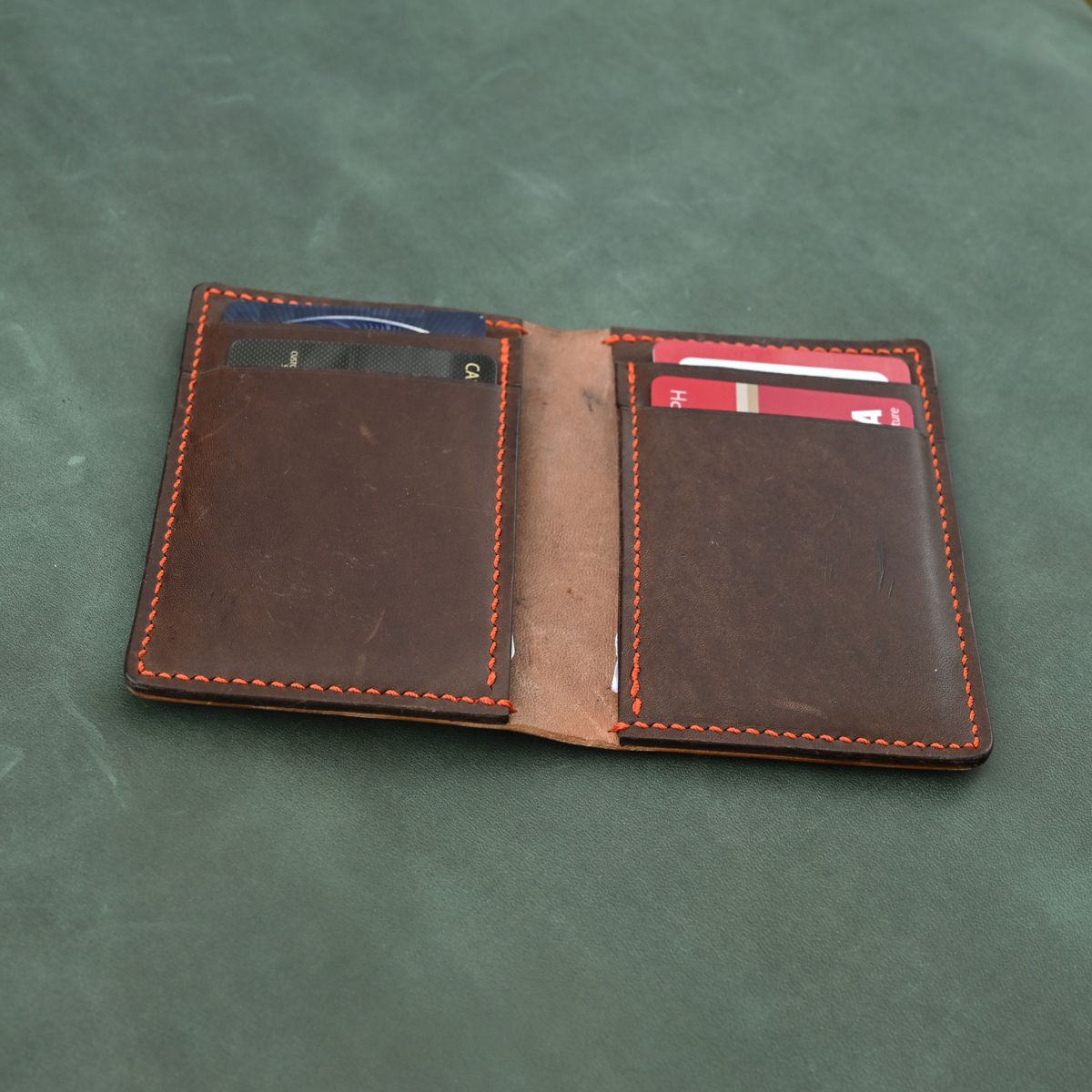 Photo by poppyseed55 on November 4, 2025 of the Self-Made Bifold in Horween Dark Cognac Shell Cordovan & Conceria Walpier Chocolate Buttero.