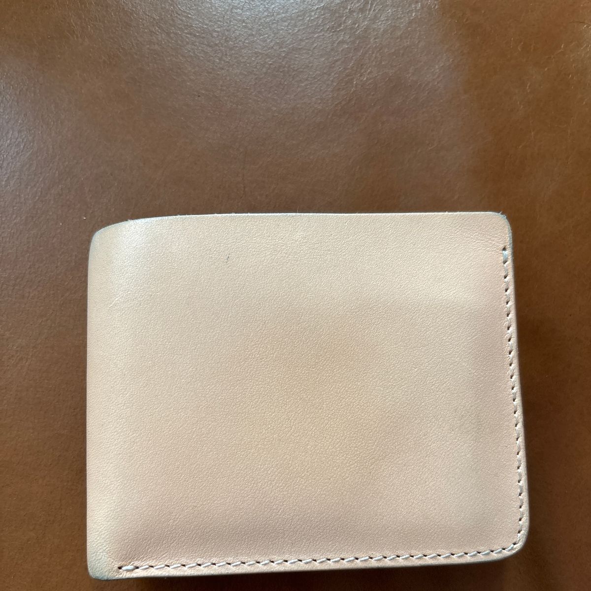 Photo by ryantaylor1115 on October 1, 2024 of the Pigeon Tree Natural Vegtan Bifold Wallet in Unknown Natural Veg Tan.