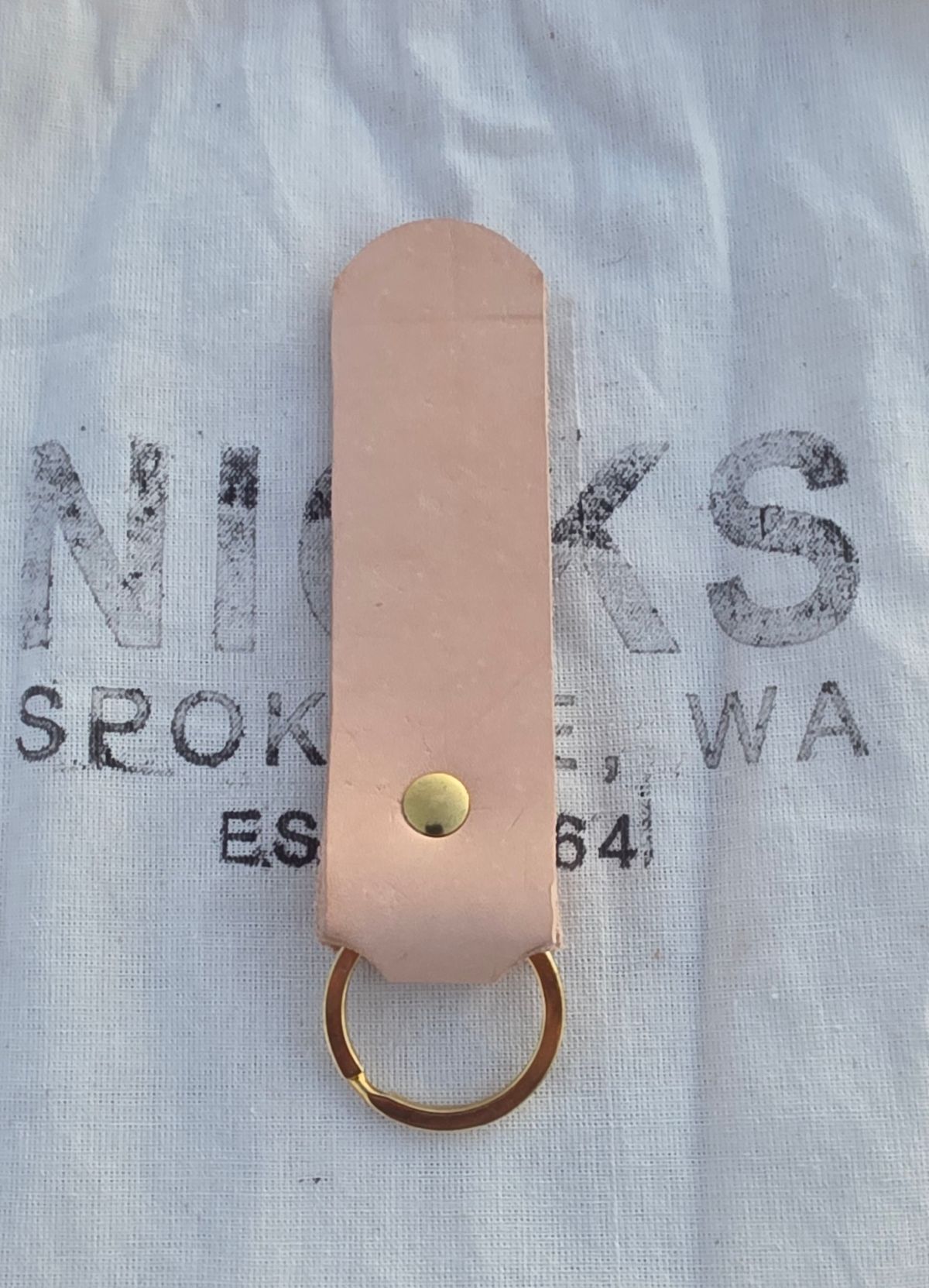 Photo by zestyclosemedicine on October 1, 2025 of the Self-Made Key Fob in Wickett & Craig Natural Veg Tan.