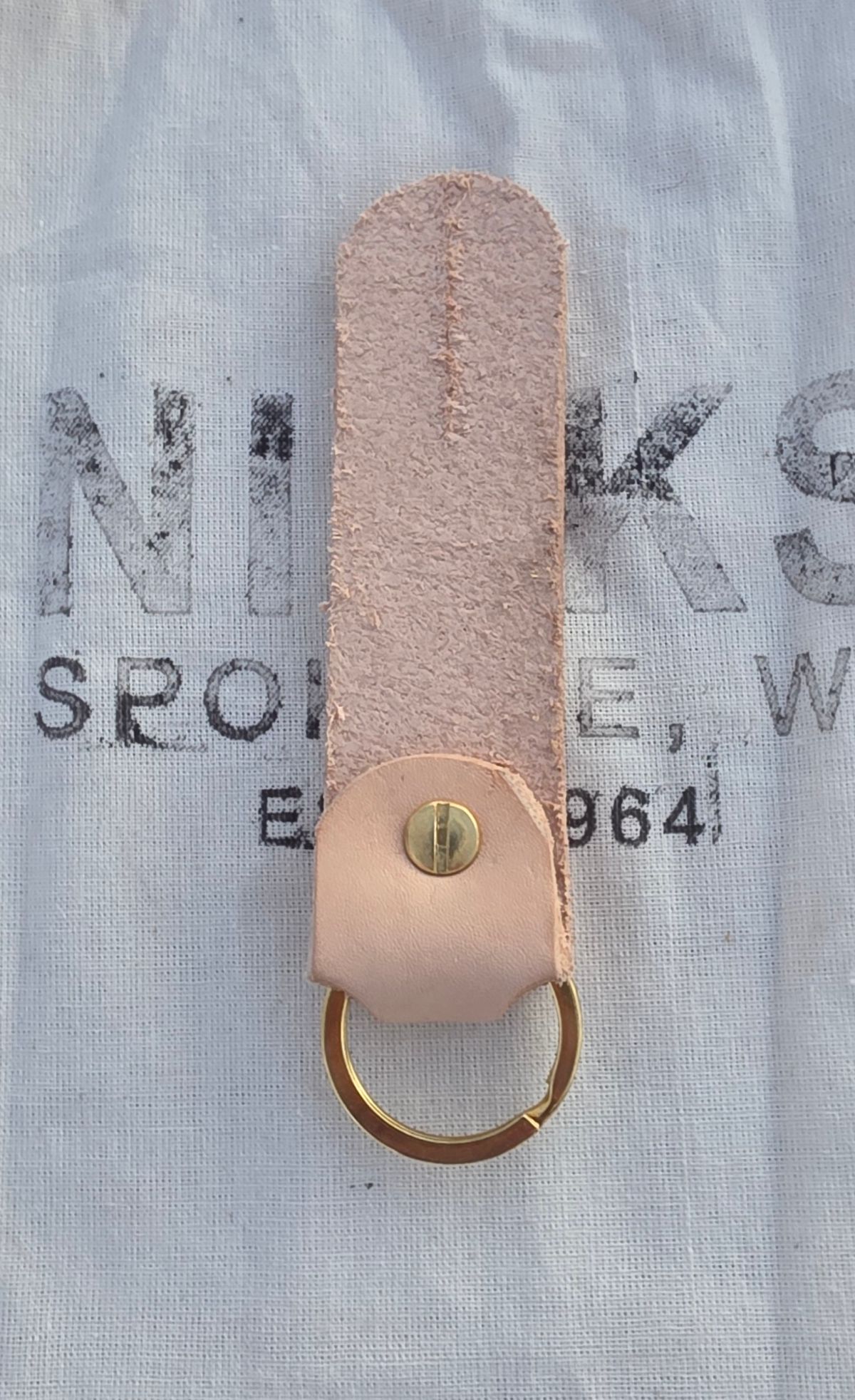 Photo by zestyclosemedicine on October 1, 2025 of the Self-Made Key Fob in Wickett & Craig Natural Veg Tan.