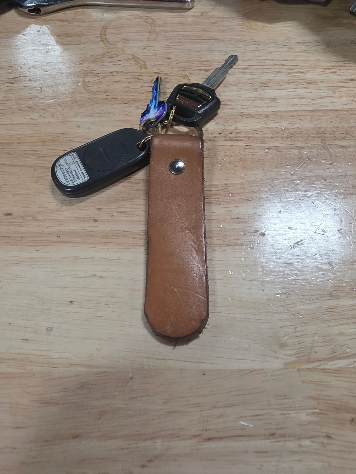 Photo by zestyclosemedicine on December 5, 2025 of the Self-Made Key Fob in Wickett & Craig Natural Veg Tan.
