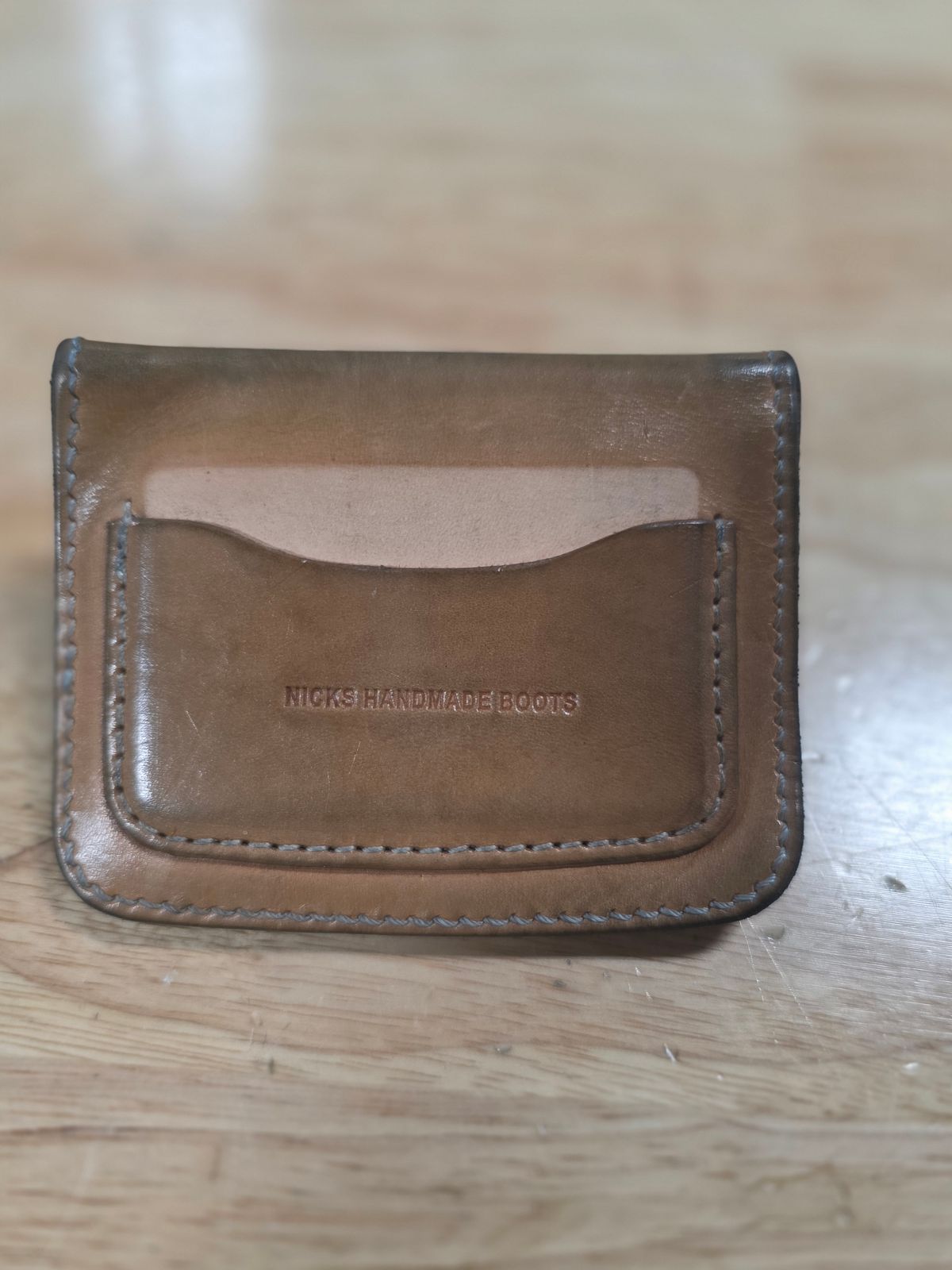 Photo by zestyclosemedicine on February 2, 2026 of the Nicks Mini Trucker Wallet in Wickett & Craig Natural Skirting.