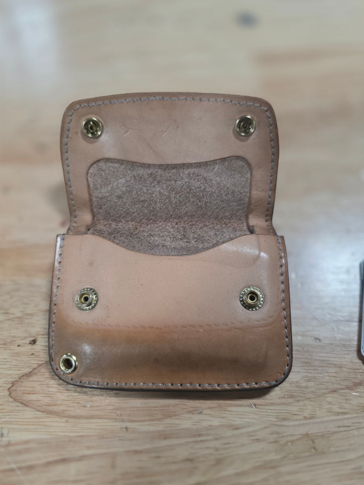 Photo by zestyclosemedicine on February 2, 2026 of the Nicks Mini Trucker Wallet in Wickett & Craig Natural Skirting.