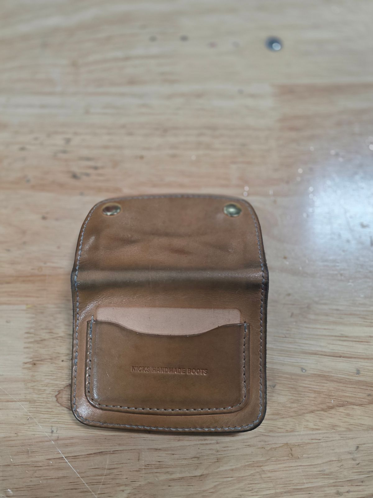 Photo by zestyclosemedicine on February 2, 2026 of the Nicks Mini Trucker Wallet in Wickett & Craig Natural Skirting.