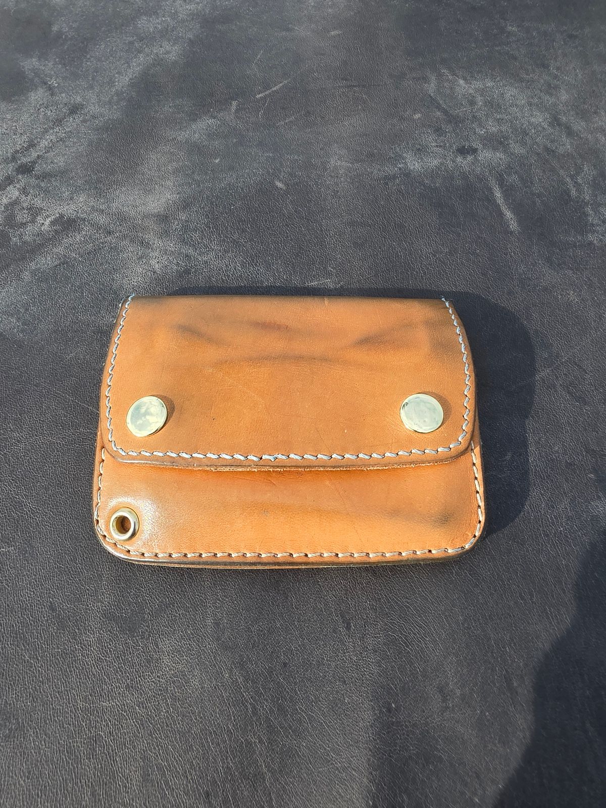 Photo by zestyclosemedicine on April 3, 2026 of the Nicks Mini Trucker Wallet in Wickett & Craig Natural Skirting.