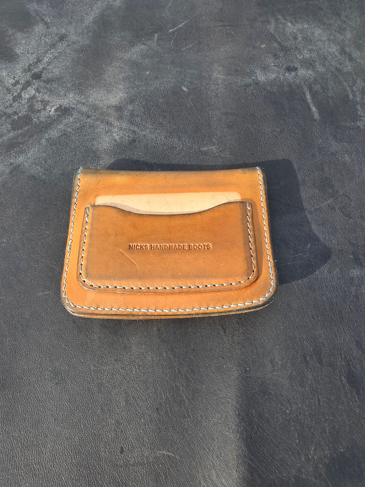 Photo by zestyclosemedicine on April 3, 2026 of the Nicks Mini Trucker Wallet in Wickett & Craig Natural Skirting.