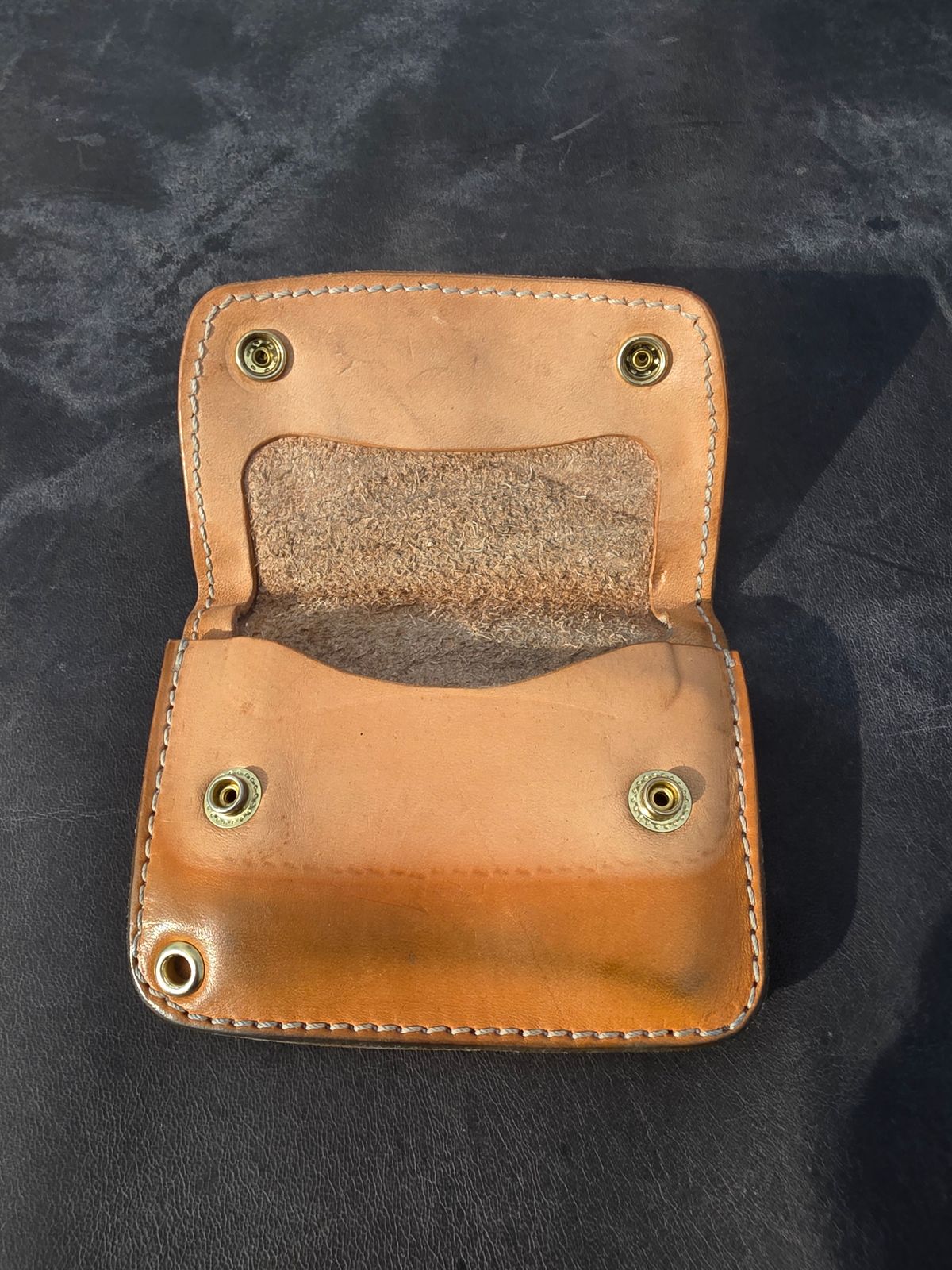Photo by zestyclosemedicine on April 3, 2026 of the Nicks Mini Trucker Wallet in Wickett & Craig Natural Skirting.