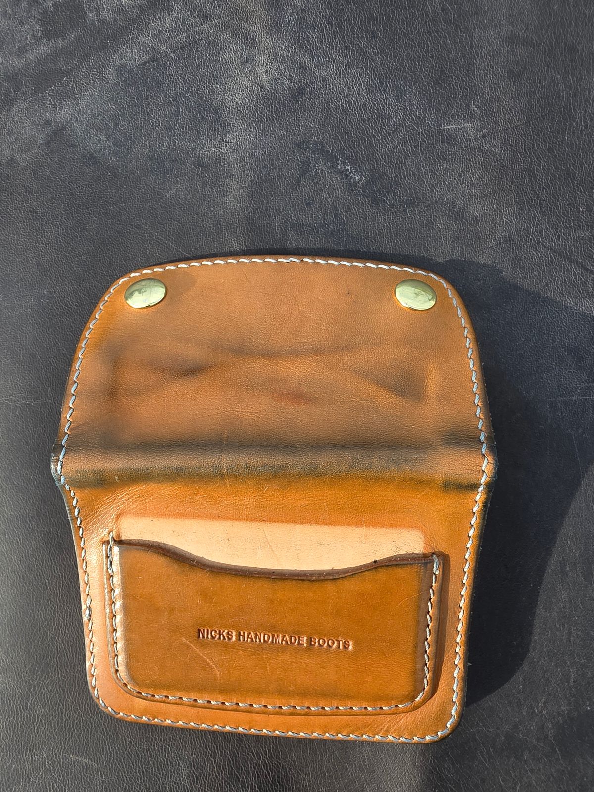 Photo by zestyclosemedicine on April 3, 2026 of the Nicks Mini Trucker Wallet in Wickett & Craig Natural Skirting.