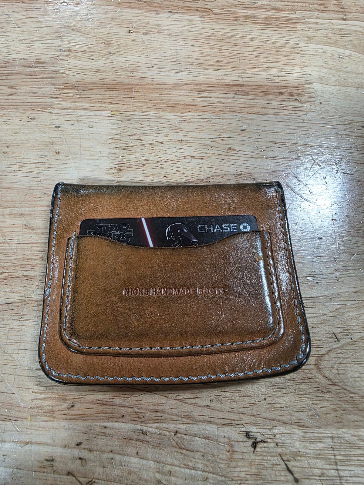 Photo by zestyclosemedicine on May 13, 2026 of the Nicks Mini Trucker Wallet in Wickett & Craig Natural Skirting.