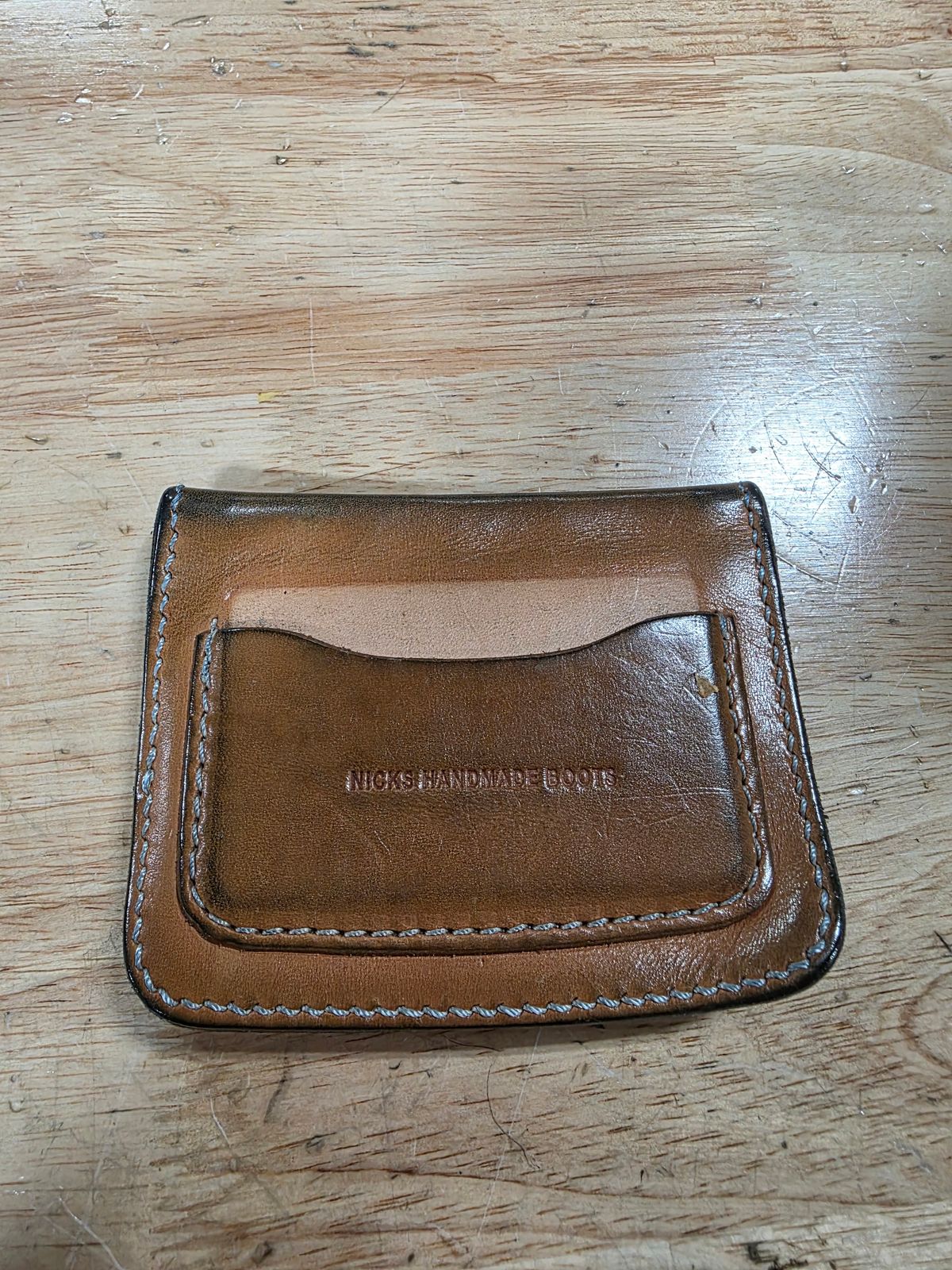 Photo by zestyclosemedicine on May 13, 2026 of the Nicks Mini Trucker Wallet in Wickett & Craig Natural Skirting.