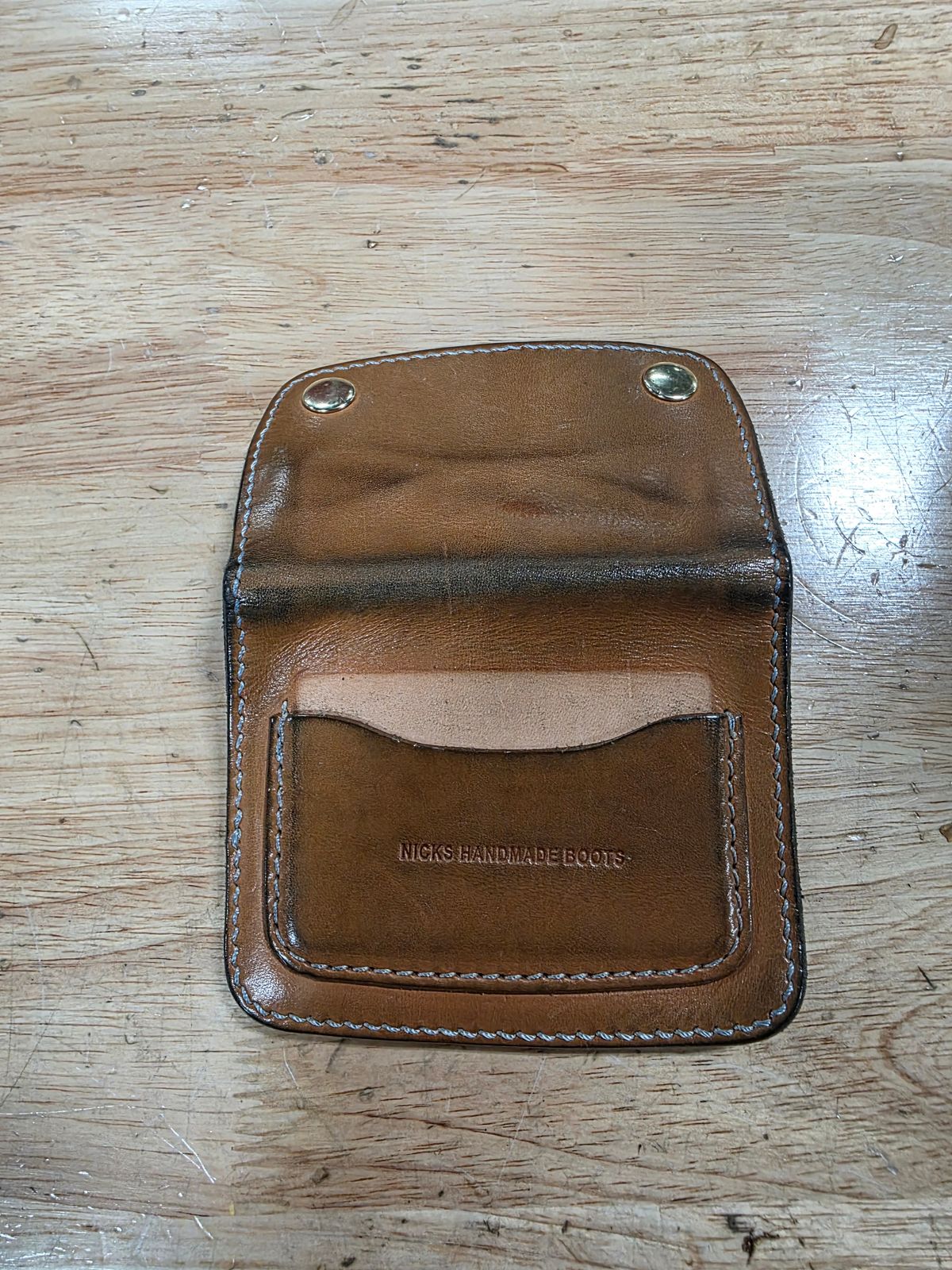 Photo by zestyclosemedicine on May 13, 2026 of the Nicks Mini Trucker Wallet in Wickett & Craig Natural Skirting.