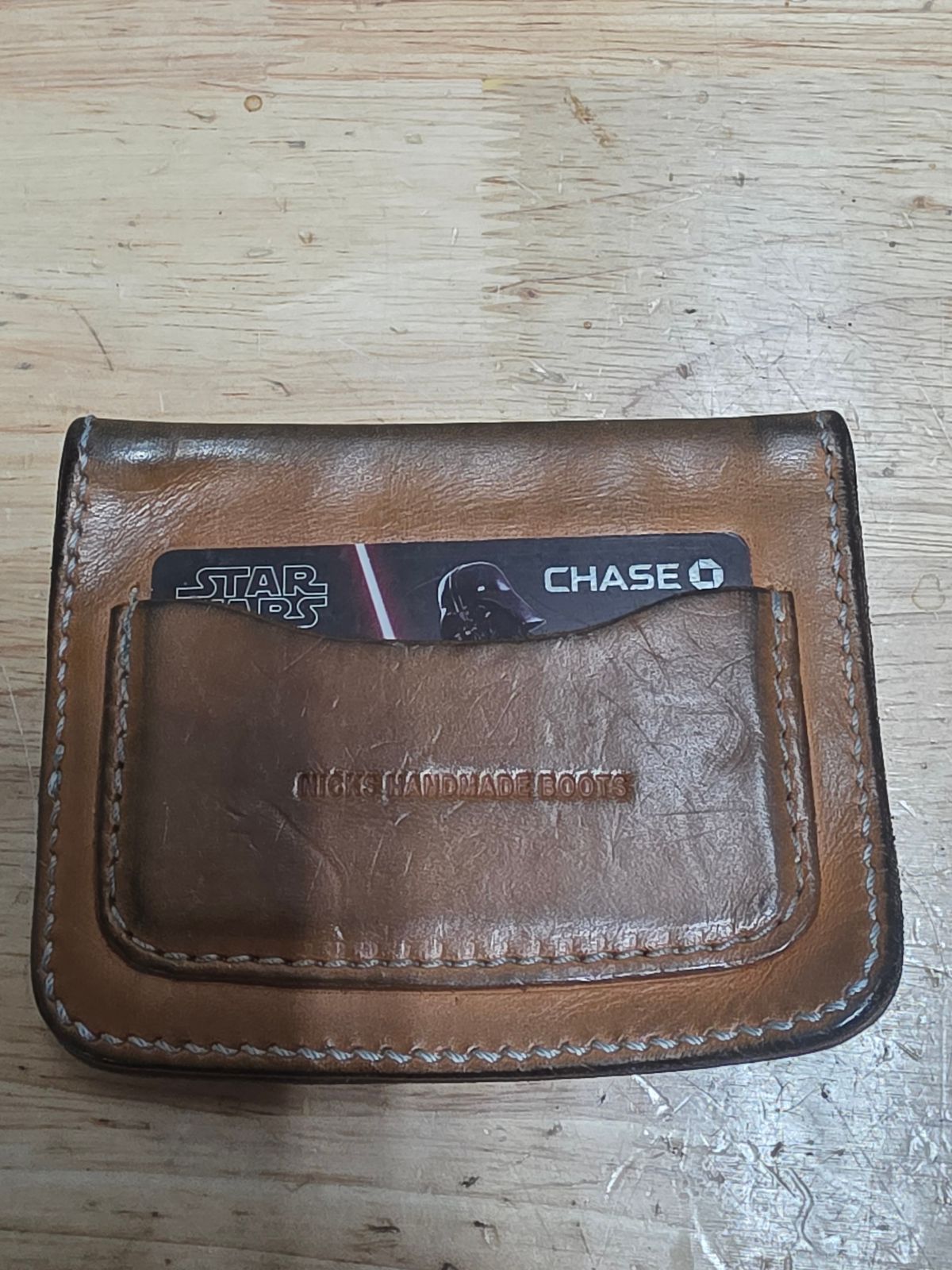 Photo by zestyclosemedicine on July 1, 2026 of the Nicks Mini Trucker Wallet in Wickett & Craig Natural Skirting.