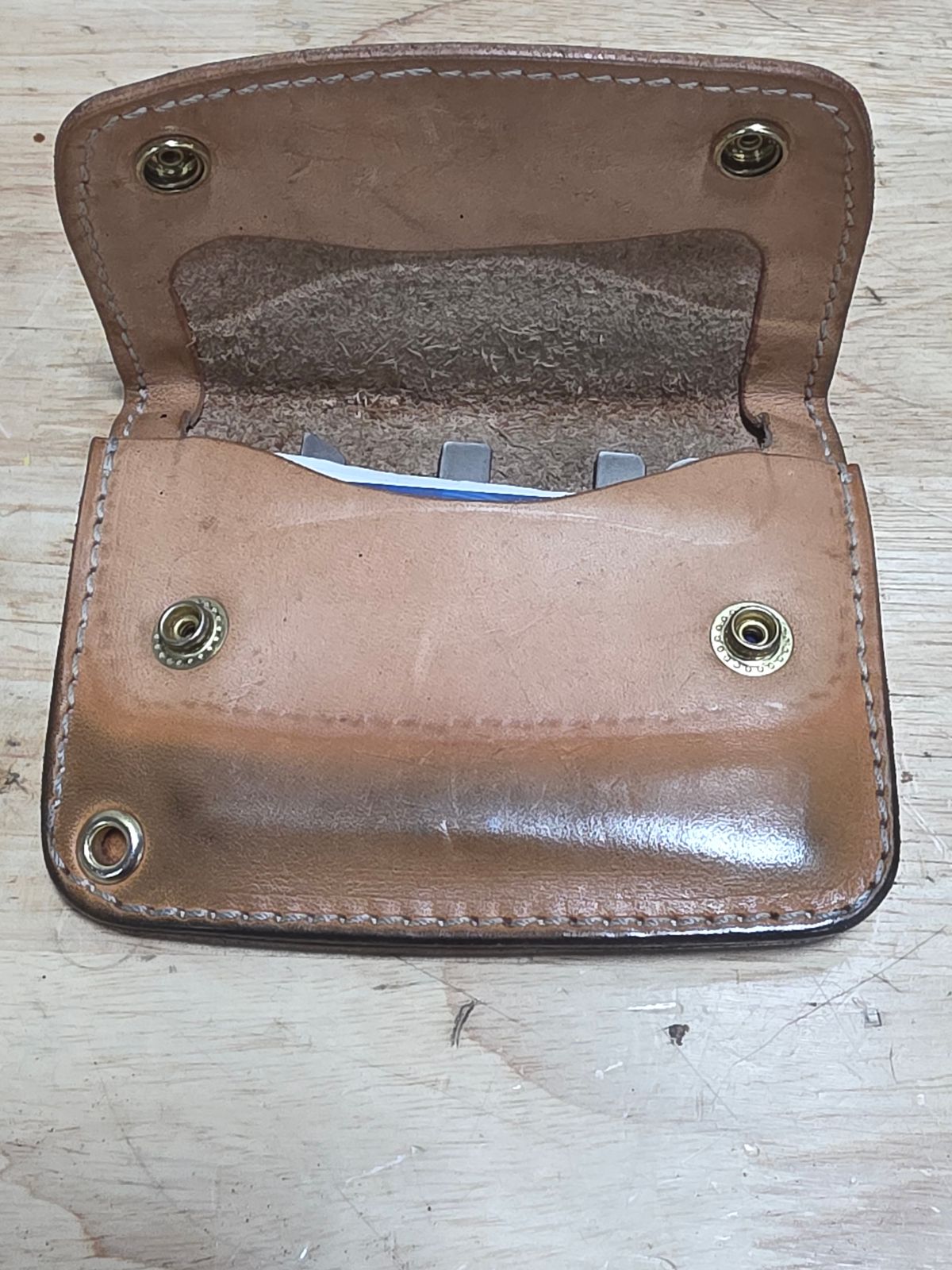 Photo by zestyclosemedicine on July 1, 2026 of the Nicks Mini Trucker Wallet in Wickett & Craig Natural Skirting.
