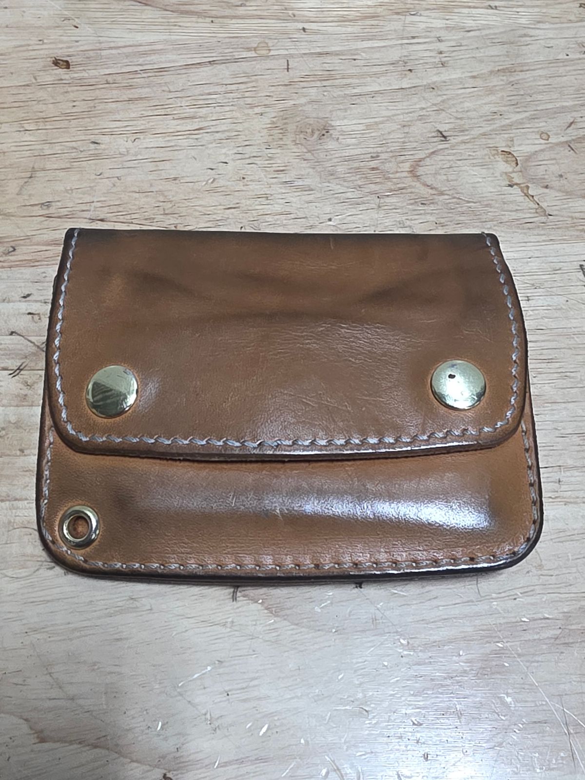 Photo by zestyclosemedicine on July 1, 2026 of the Nicks Mini Trucker Wallet in Wickett & Craig Natural Skirting.
