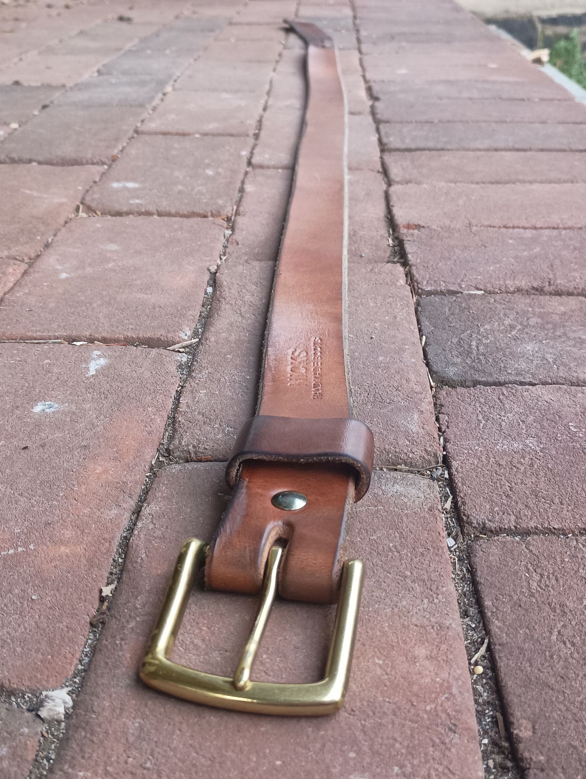 Photo by mnstrsvg21 on April 3, 2026 of the Nicks Heavy Duty Leather Work Belt in Wickett & Craig Buck Brown Traditional Harness.