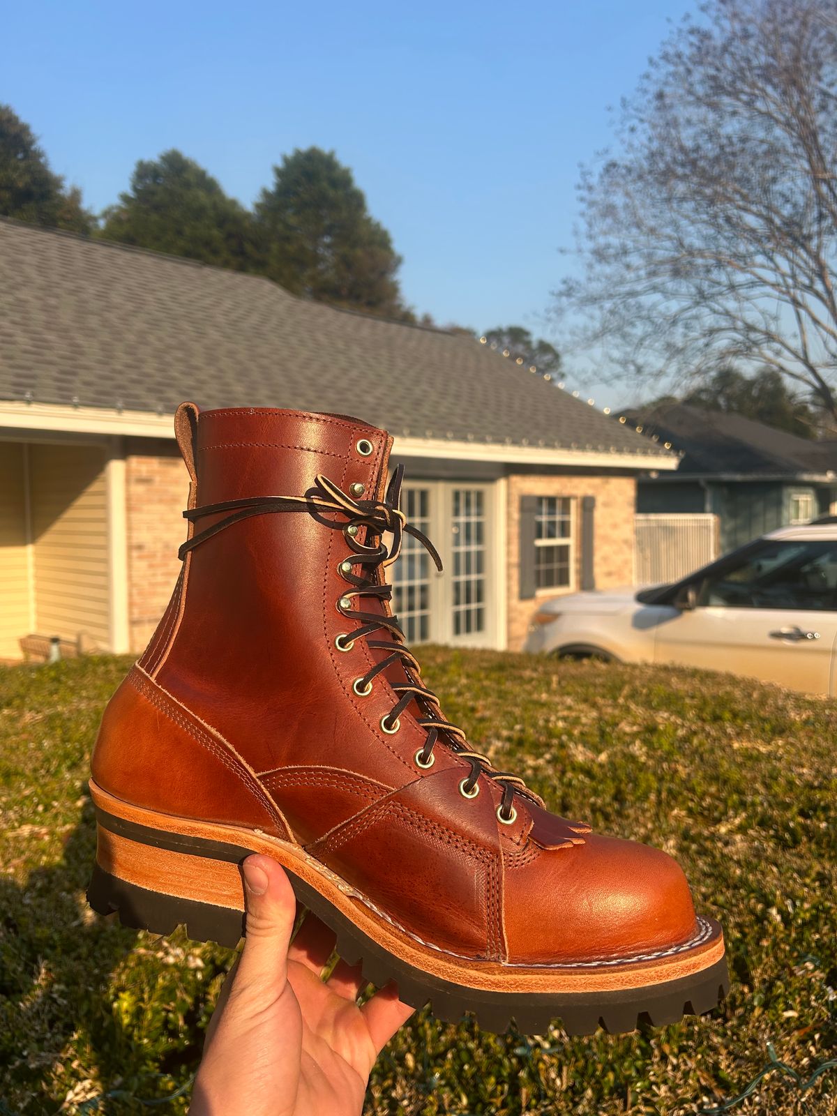 Photo by AlmightyRacko on December 20, 2024 of the Frank's Boots Lace-To-Toe in Wickett & Craig Tan Oiled Latigo.