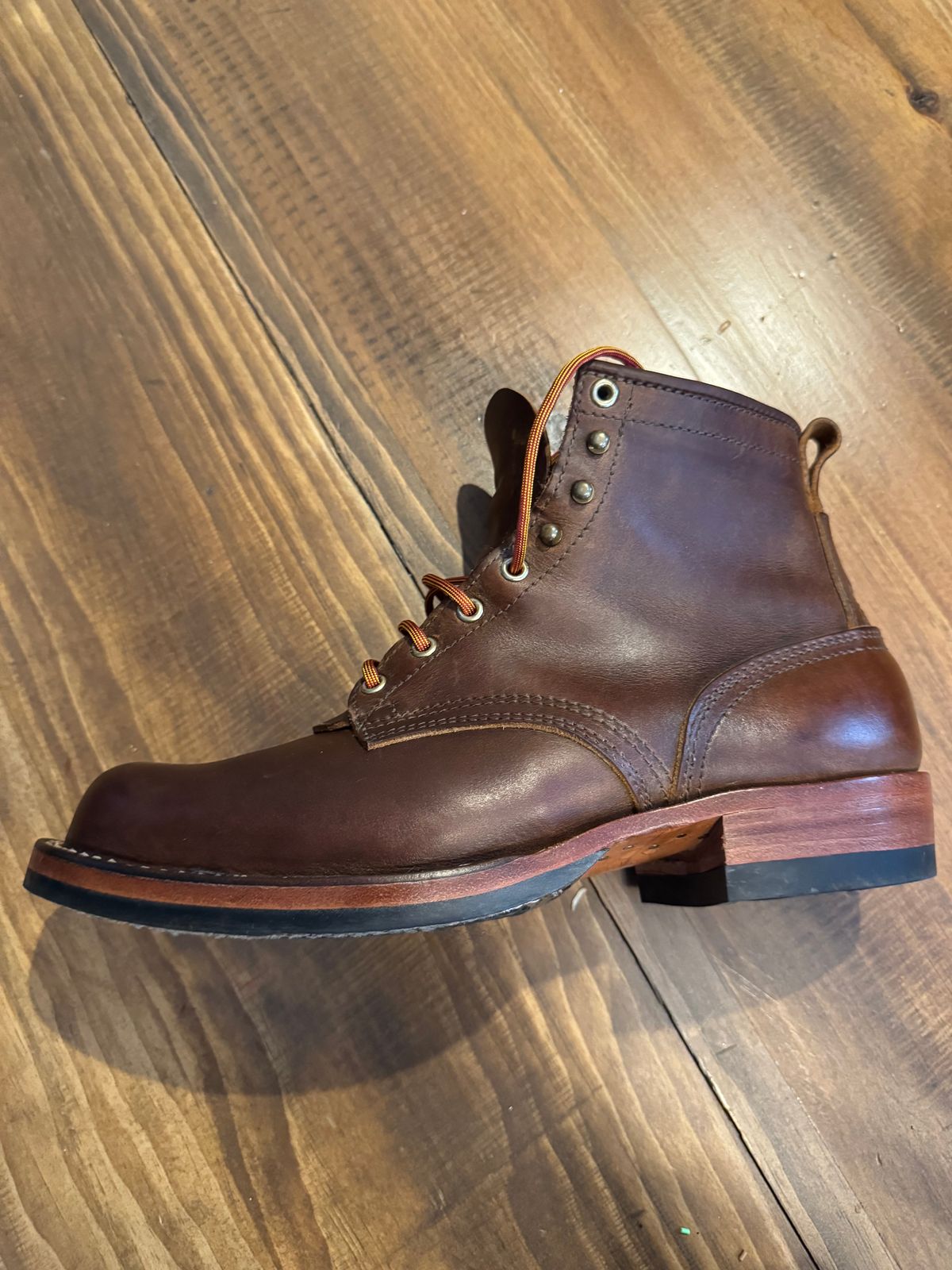 Photo by dmtr on May 23, 2025 of the Nicks Robert in Horween Orange Predator.