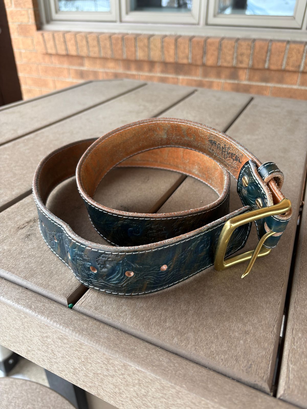 Photo by kablamb11 on February 3, 2026 of the Harker Leatherworks Squall Belt in Marbled Blue Overdyed Wickett and Craig Bridle.